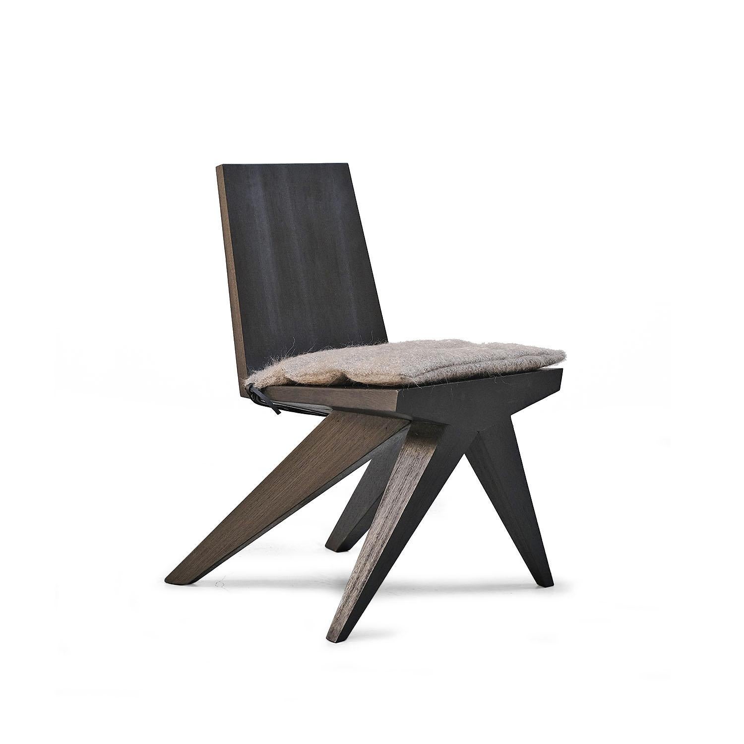 Contemporary dining chair in iroko wood - v-dining chair by Arno Declercq

Material: 
Burned and waxed Iroko wood.
Cushion made in mohair by Pierre Frey. More fabrics available on request.

Dimensions: 
46 cm W x 57 cm L x 81 cm H
18” W x
