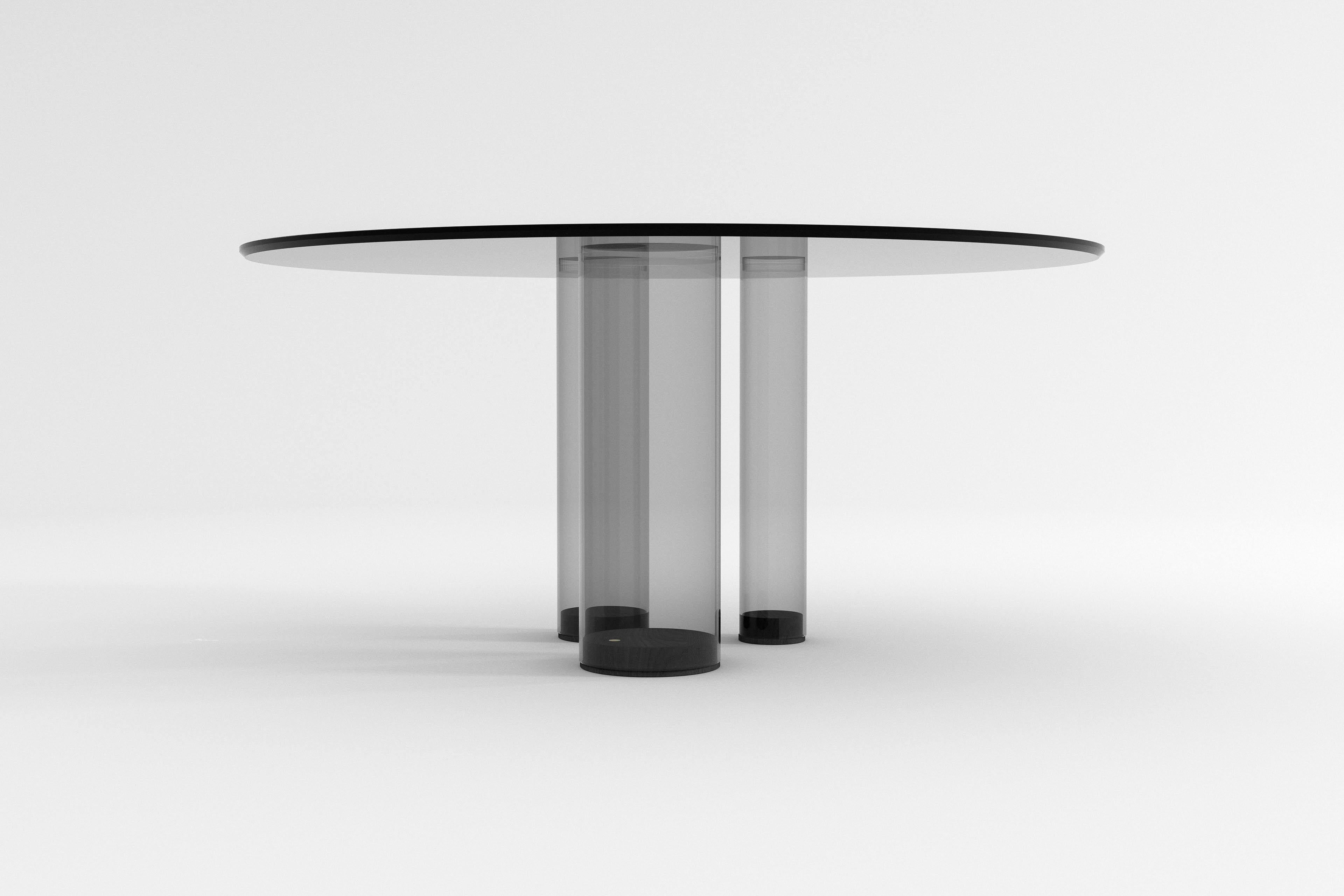 round glass dining table with black base