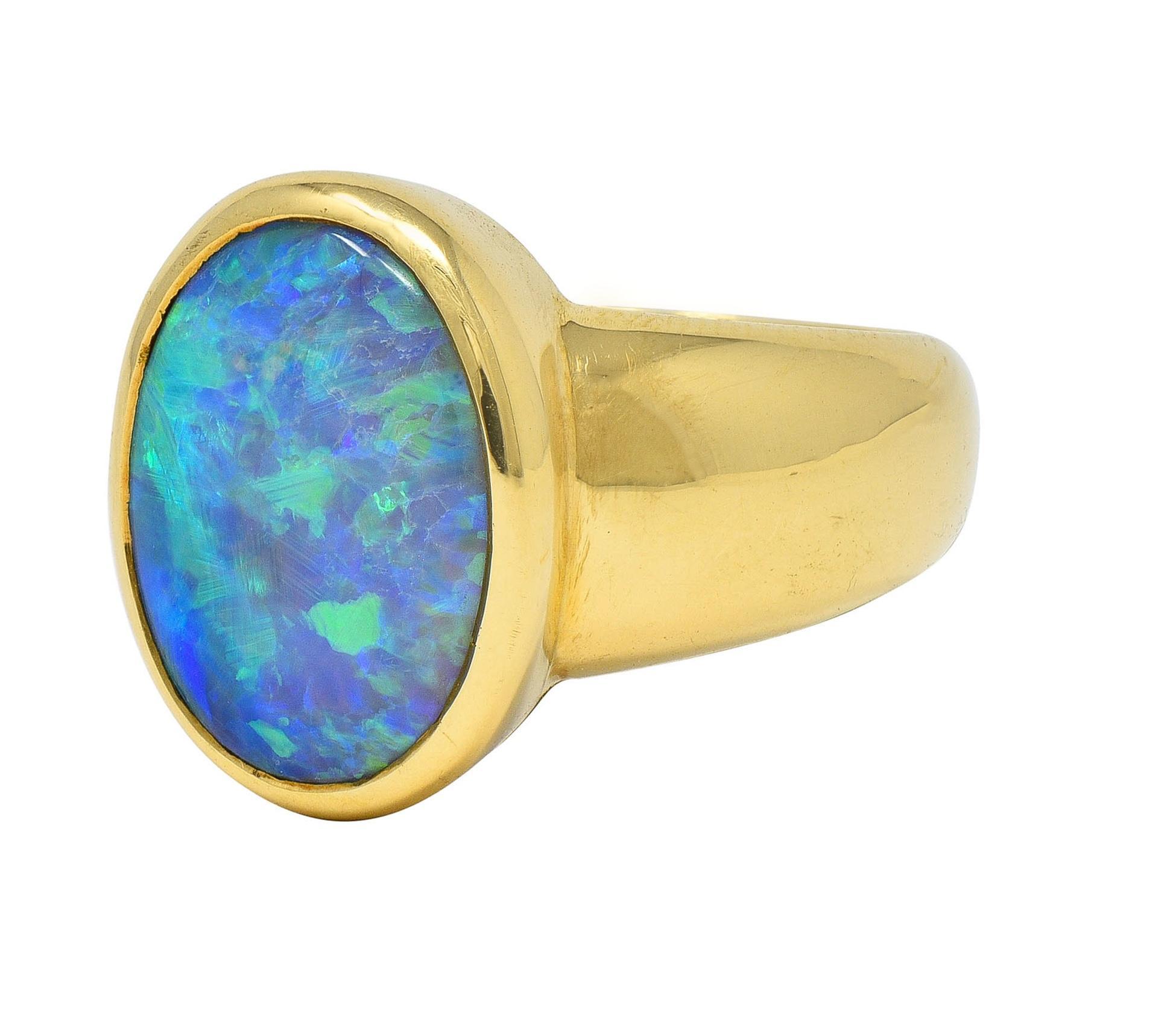 Women's Contemporary Black Opal 18 Karat Yellow Gold Puffed Bezel Gemstone Ring For Sale