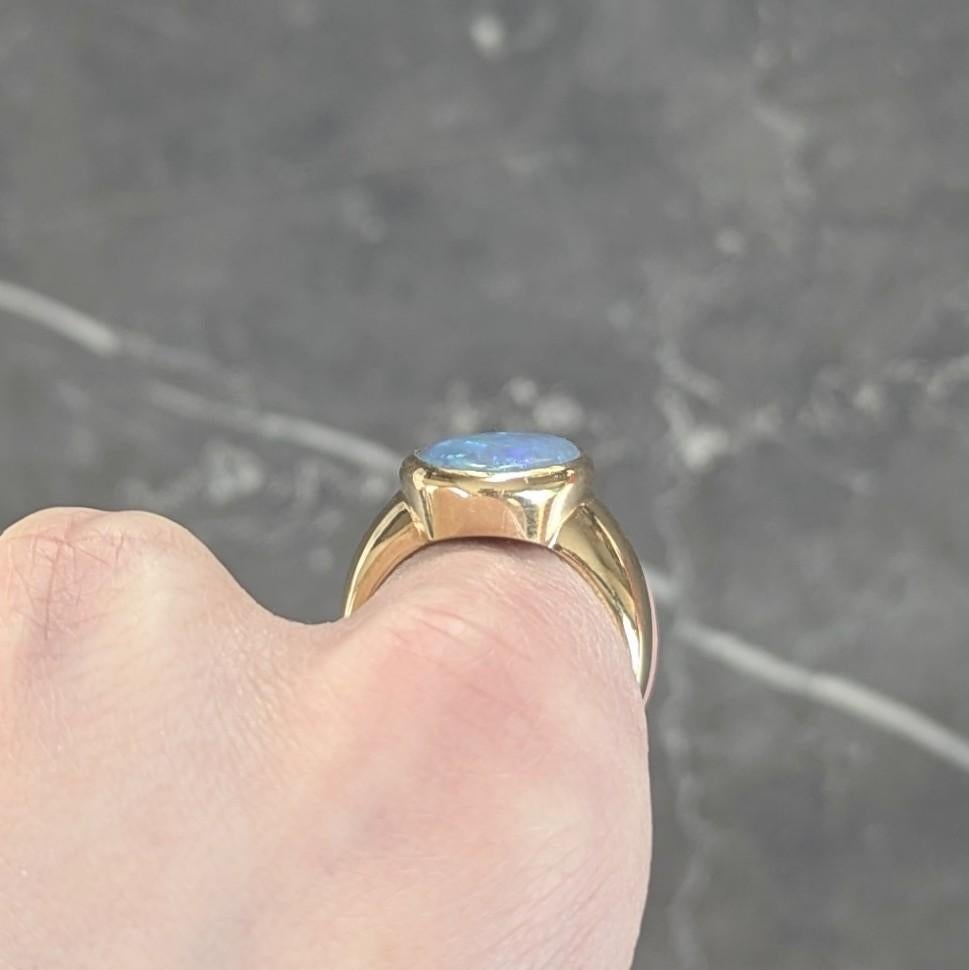 Contemporary Black Opal 18 Karat Yellow Gold Puffed Bezel Gemstone Ring For Sale 4