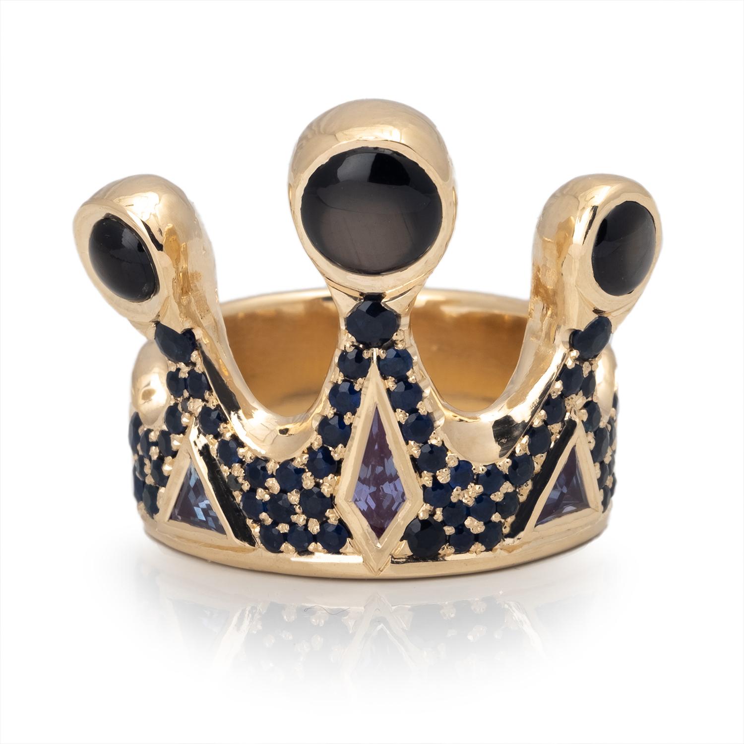 One of a Kind Crown Ring encrusted with blue sapphires and topped with Black Star Sapphires. This sculptural ring makes a bold statement and is a wearable work of art. If you like this ring, check out the companion piece in our collection. Listing