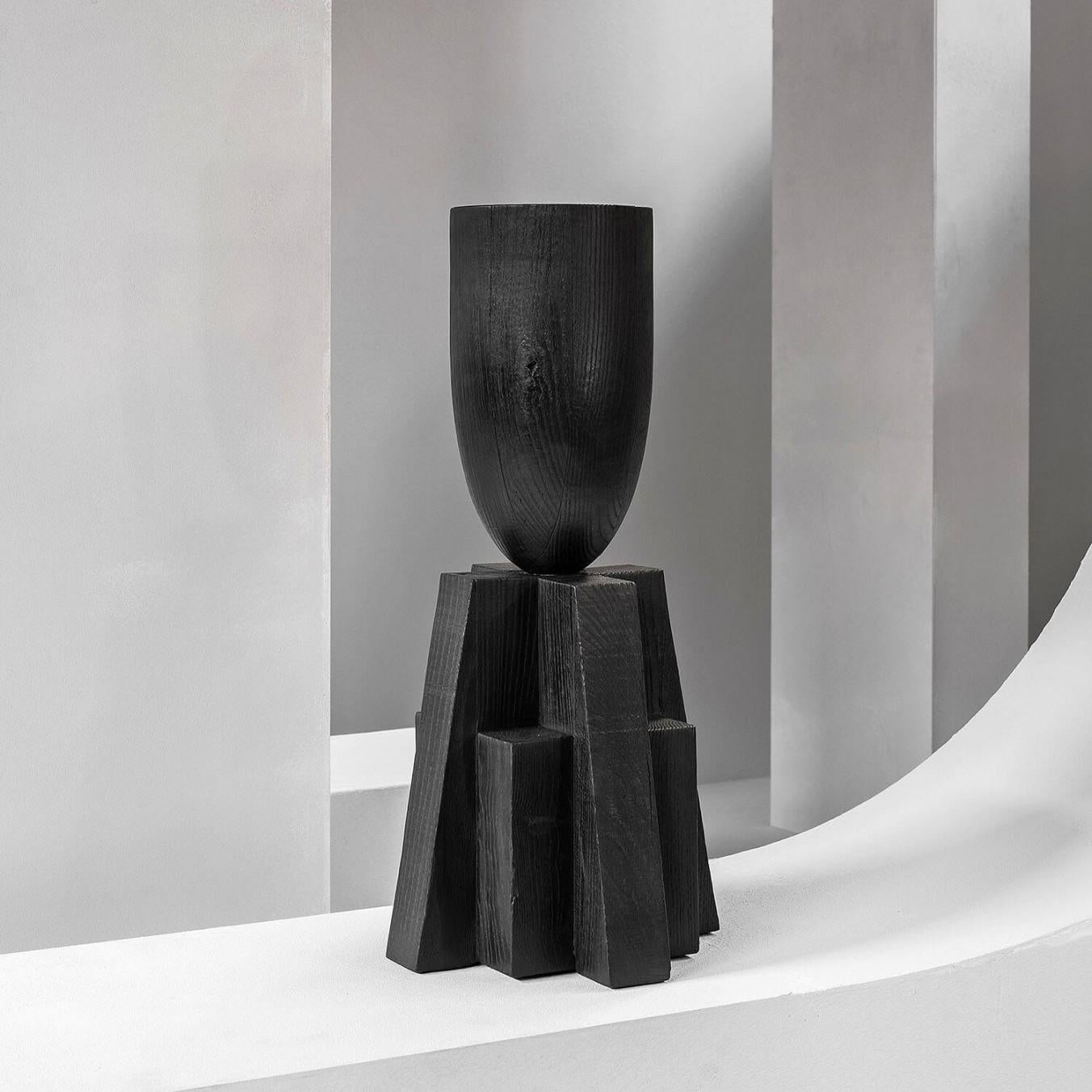 Contemporary Black Vase in Oak, Babel Vase by Arno Declercq

Dimensions: W 32 x L 32 x H 65 cm
Materials: Burned and waxed oak

Made by hand, in Belgium.

Arno Declercq
Belgian designer and art dealer who makes bespoke objects with passion