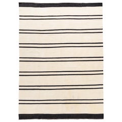 Tappeto contemporaneo in lana a trama piatta Rug & Kilim a righe bianche e nere