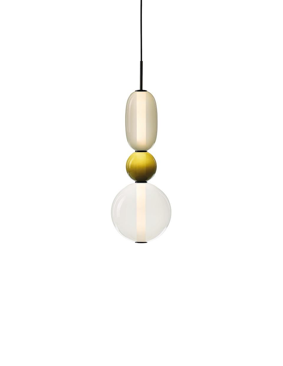Contemporary blown crystal glass pendant - pebbles by Boris Klimek for Bomma.

Pebbles are reminders of exceptional moments or favorite places. Their diverse shapes and colors inspired BOMMA’s playful collection that invites you to express your