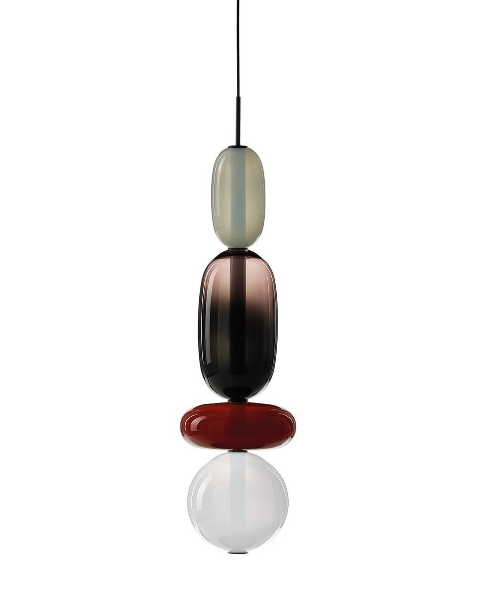 Contemporary blown crystal glass pendant - Pebbles by Boris Klimek for Bomma

Pebbles are reminders of exceptional moments or favorite places. Their diverse shapes and colors inspired BOMMA’s playful collection that invites you to express your