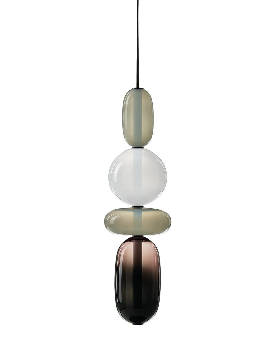 Contemporary blown crystal glass pendant - pebbles by Boris Klimek for Bomma.

Pebbles are reminders of exceptional moments or favorite places. Their diverse shapes and colors inspired BOMMA’s playful collection that invites you to express your