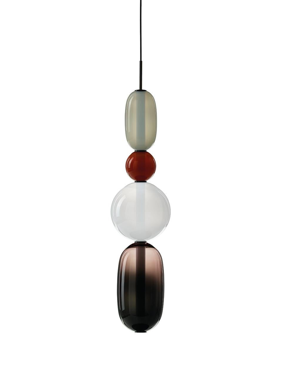 Contemporary blown crystal glass pendant - pebbles by Boris Klimek for Bomma

Pebbles are reminders of exceptional moments or favorite places. Their diverse shapes and colors inspired BOMMA’s playful collection that invites you to express your