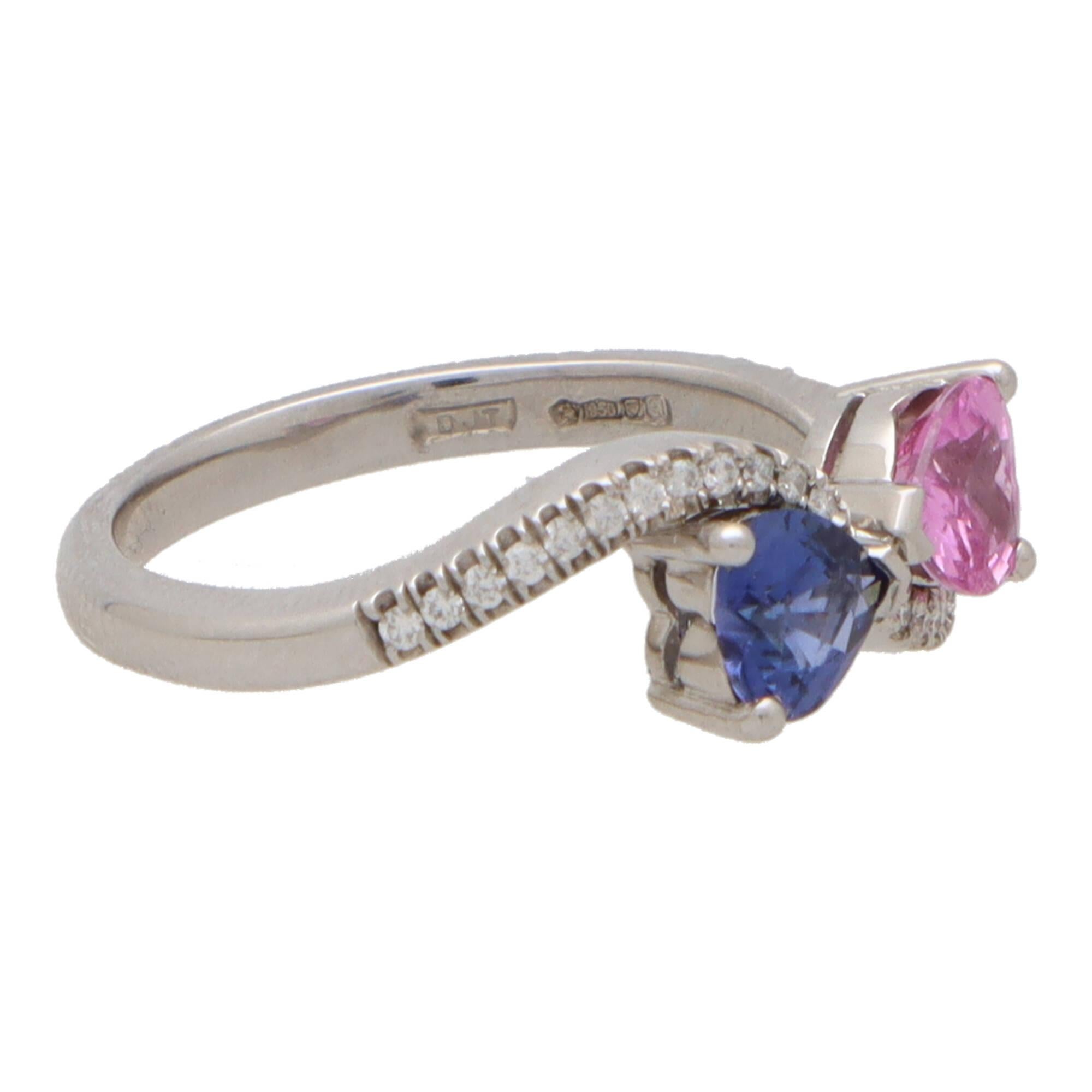 A unique pink and blue sapphire toi-et-moi crossover ring set in 18k white gold.

The phrase ‘toi-et-moi’ simply means ‘me and you’ and is famously known for being one of the most romantic ring designs in the jewellery industry. A classic toi-et-moi