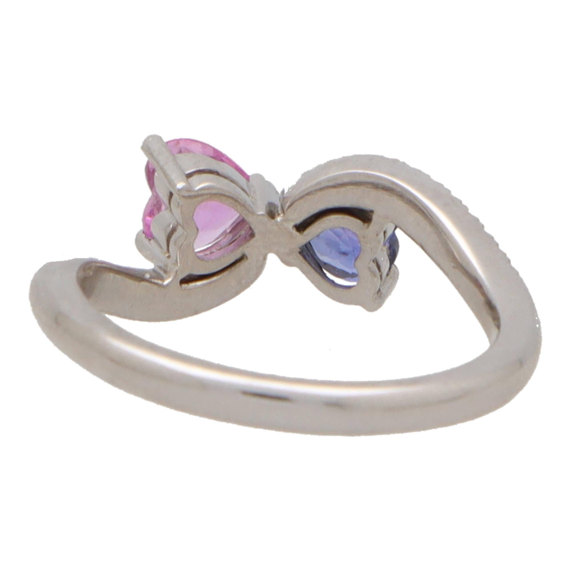 Heart Cut Contemporary Blue and Pink Sapphire Toi-et-moi Crossover Ring in White Gold