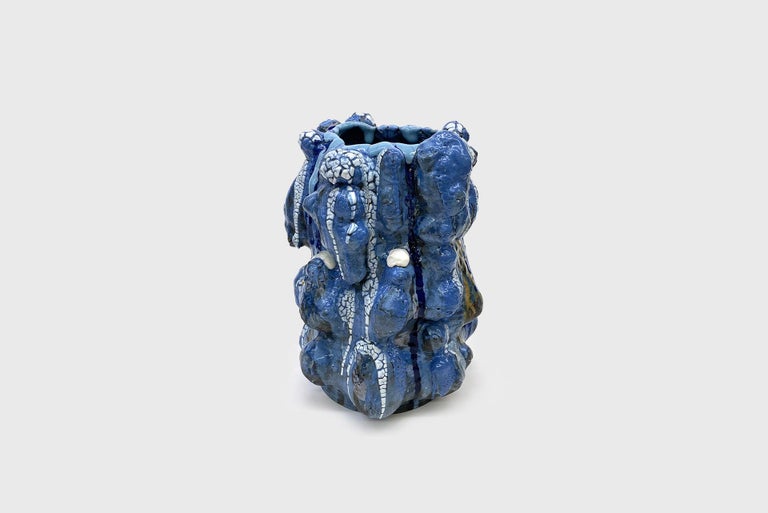 Ceramic vase model “Blue with blue lip” 
From the series “Potato Tree” 
Manufactured by Vince Palacios 
USA, 2022 
Clay, slip, glaze, flux, firings 

The “Potato Tree'' series are defined as impossible, poetic, nonsensical forms. Vince