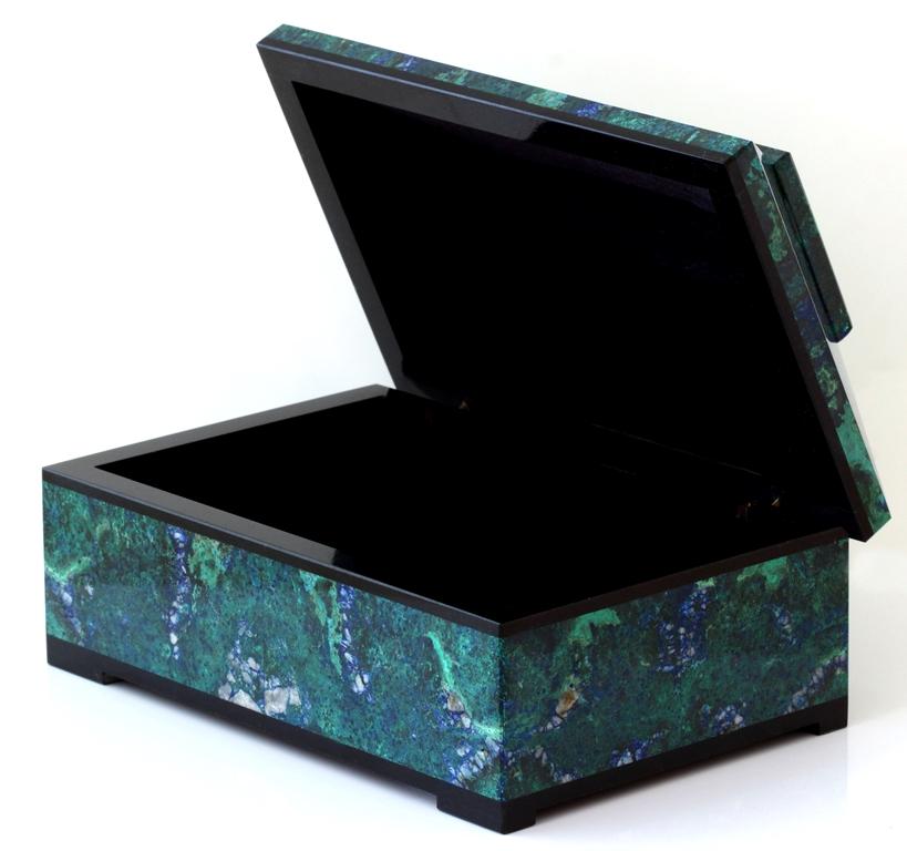 Invite healing energy into your home with an exquisite blue green azurite malachite box. This box is beautifully made with a hinged lid and expert construction. Lined in black velvet with black marble trims. Finished to a high polish to show off the