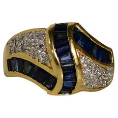 Contemporary Blue Sapphire and Diamond Pave Ring in 18k Yellow Gold