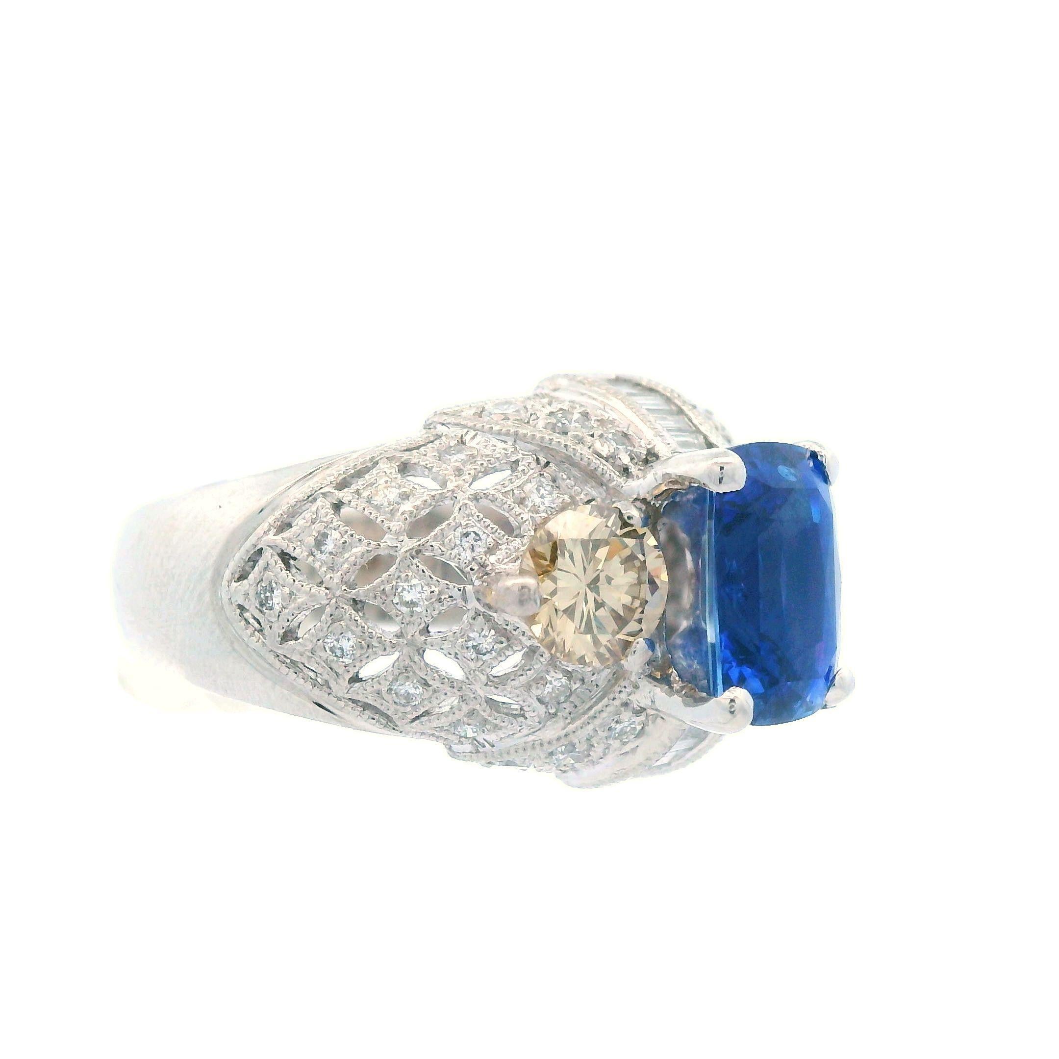 Zeitgenössisch  Blauer Saphir & ausgefallener Diamant Platinring (Rundschliff) im Angebot