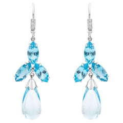 Pendientes colgantes contemporáneos con topacio azul y diamantes en forma de briolette, en oro de 18 quilates