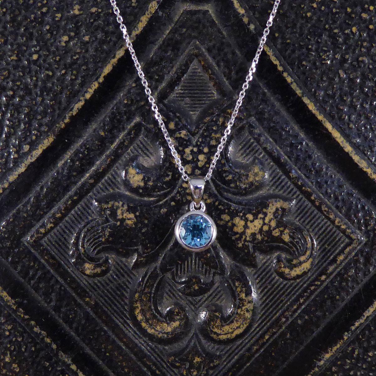 Round Cut Contemporary Blue Topaz Rub Over Pendant on White Gold Chain For Sale