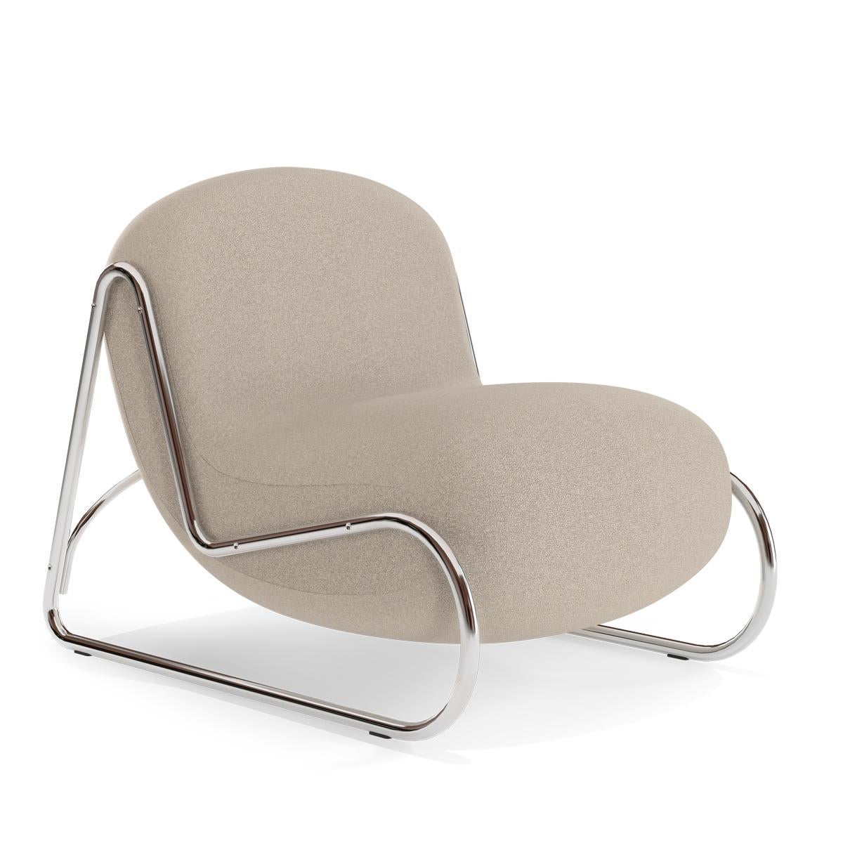 Boho Chair
Signed by Kristian Sofus Hansen and Tommy Hyldahl for Norr11. 

Model shown on the main picture: 
Frame: Mirror Chrome Steel
Fabric: Zero col. 0012

Chair 
W 65 cm / D 94 cm / H 73,5 cm / SH 44 cm

The Boho Chair draws inspiration from