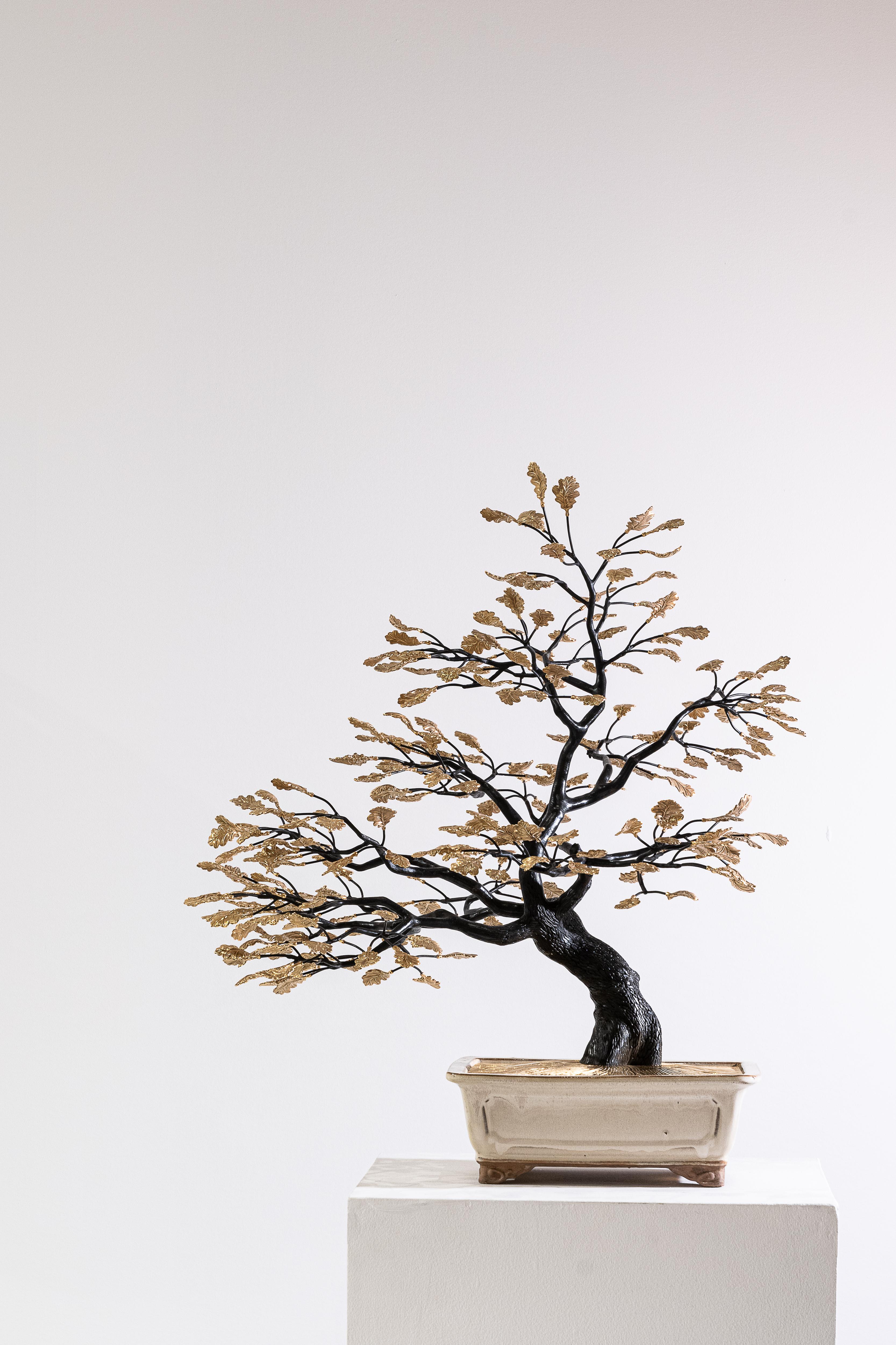 Bonsai Tree by Pierre Salagnac
Material: Bronze, 24K gold, brass
Dimensions: H 61 x 56 x 59 cm
Type: one-of-the-kind
Year: 2023

Revealing the organic curves of nature in the metal block with great talent, Pierre Salagnac has made a name for himself