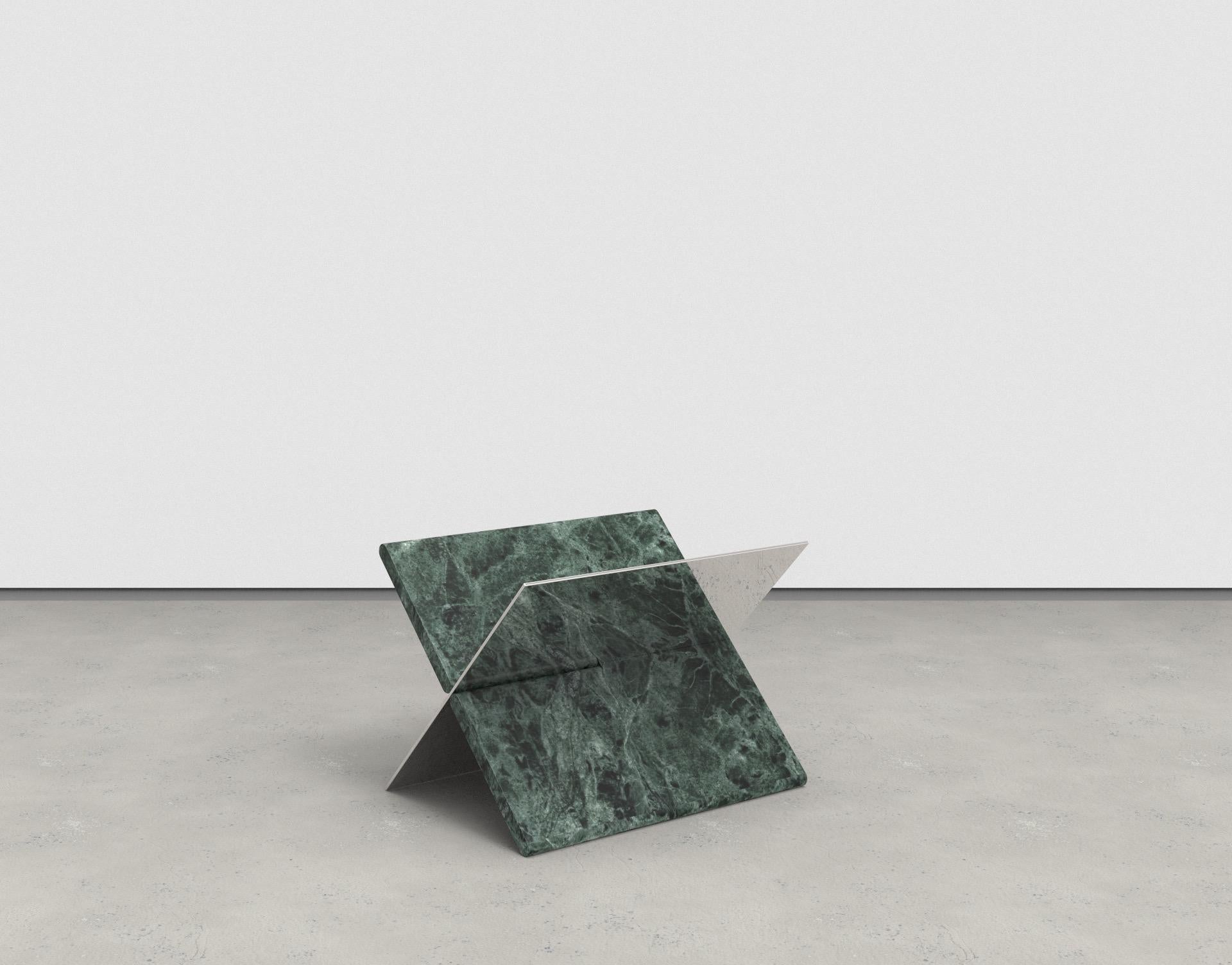 MM01 is a flat pack bookstand that puts emphasis on the material combination.
Contrasting material of natural stone and manmade reflective metal plates created an interesting composition.
Made with marble slab and reflective stainless steel plate.