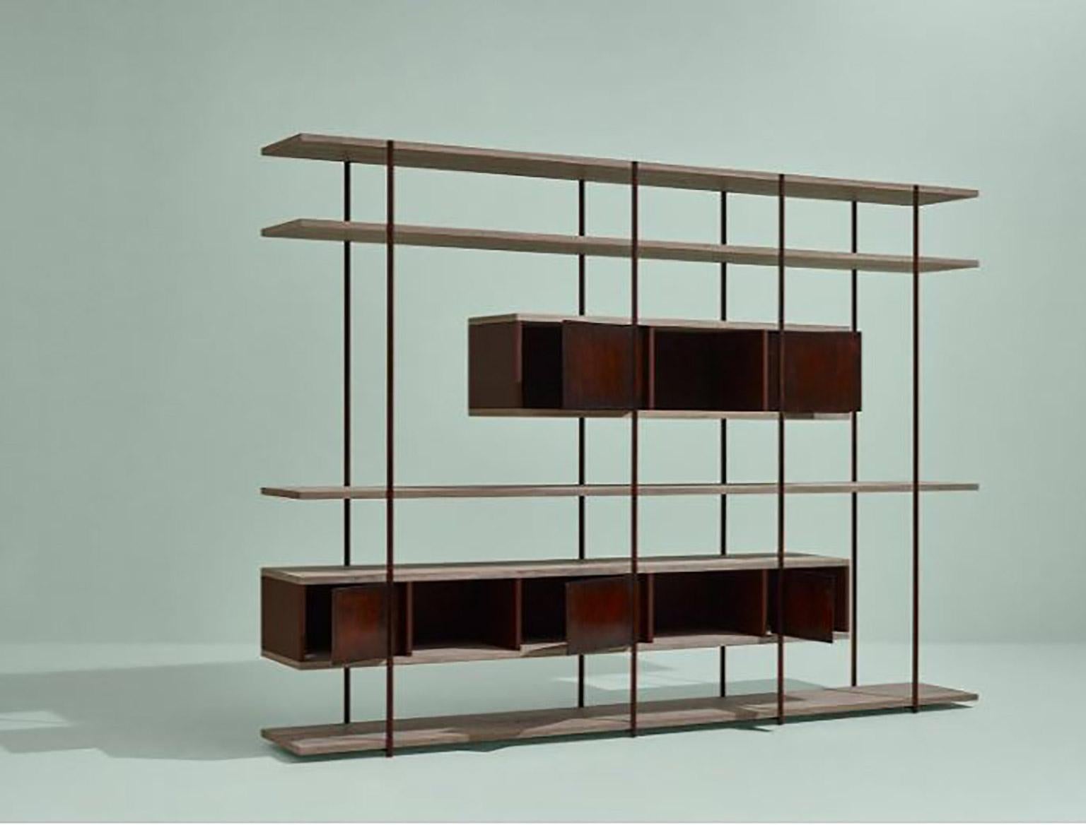 SEM Pivot collection, bookcase C, simple and sculptural. The supporting structure is a rigid system of metal tubes to which are added shelves in beautiful stone elm wood combined with various lacquered containers. The pivoting mechanism for cupboard