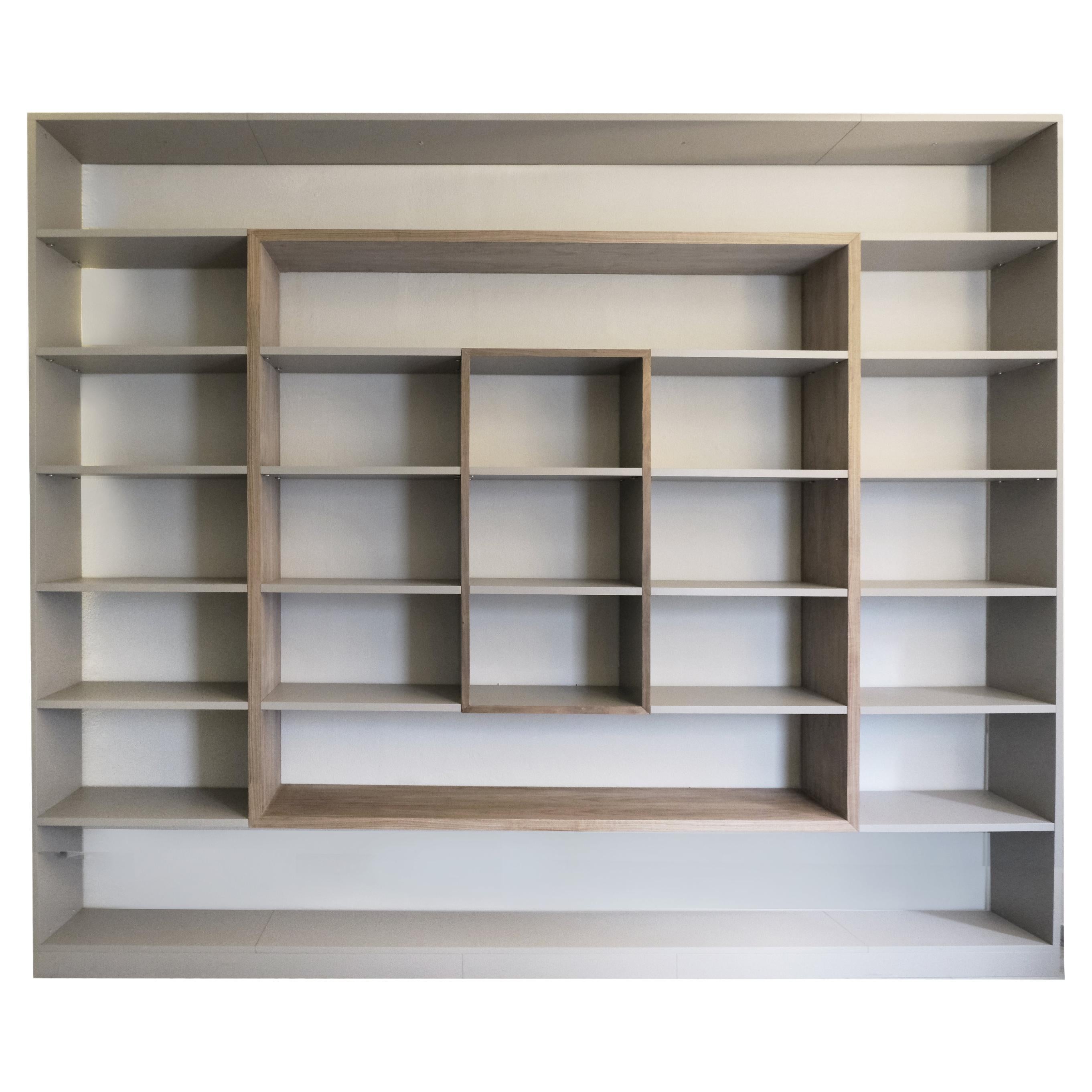 contemporary bookcase Frame  built with precious canaletto walnut board. For Sale