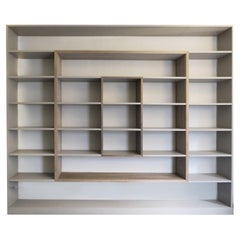contemporary bookcase Frame  built with precious canaletto walnut board.