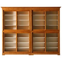 Libreria contemporanea in stile Biedermeier, ante scorrevoli, in legno di ciliegio