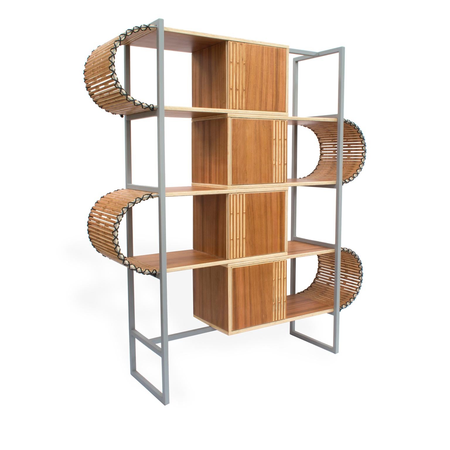 This contemporary bookshelf is from the Ruptura collection, inspired by woodworking techniques, where a series of parametric cuts are made in a single piece of wood, with this process it is possible to obtain a malleability in this wood and at the