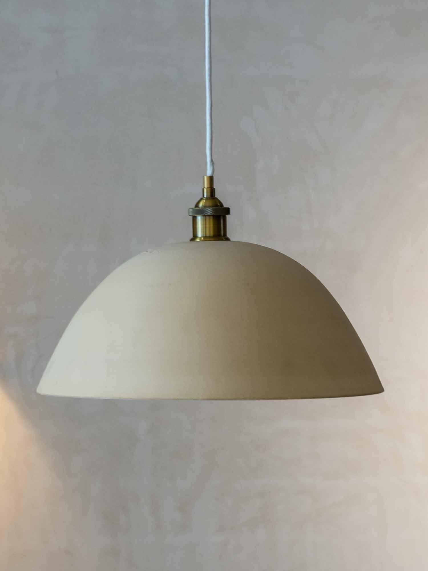 Ceramic pendant lamp handcrafted The electrical connection of the lamp is suitable for both the American and European markets. The interior of the piece is vitrified in white to achieve a better use and projection of light (The bulb is not