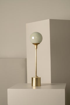Contemporary brass & blown glass Atomo table lamp by Isabel Moncada.