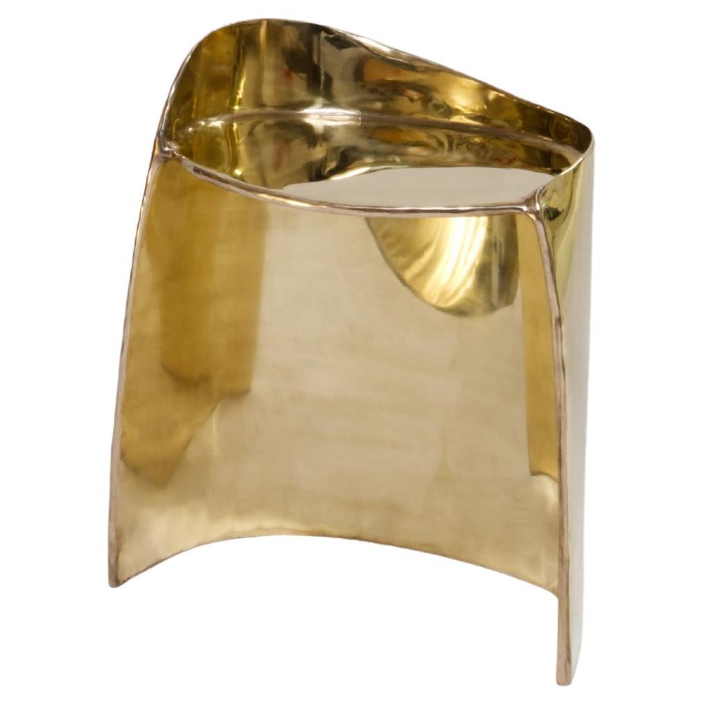 Contemporary brass Calle stool with organic shape