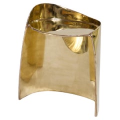Contemporary brass Calle stool with organic shape