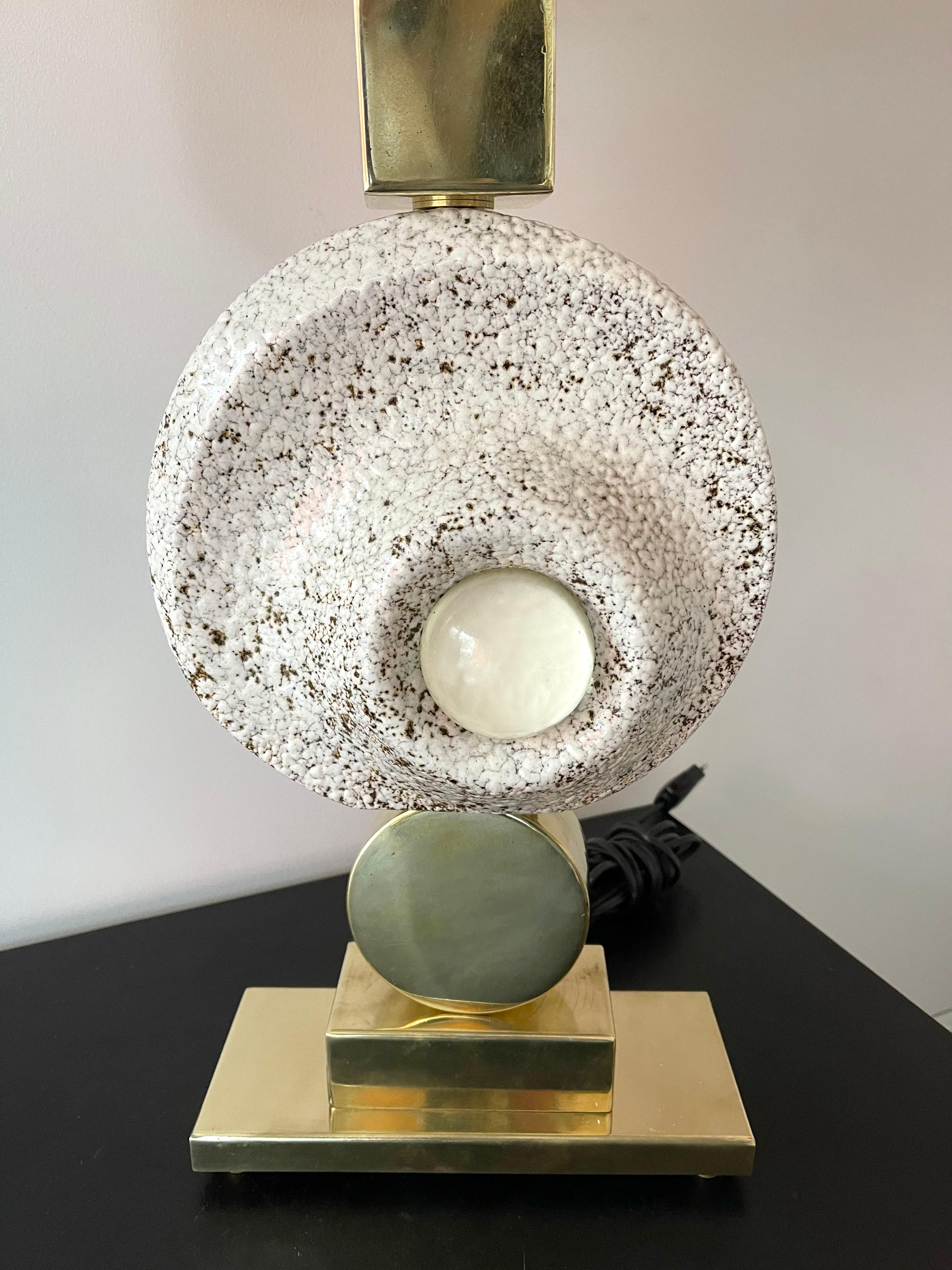 Table or bedside brass, ceramic terracotta and Murano glass eye sculpture lamp. Contemporary work from a small Italian artisanal workshop.

Demo shade non included. Measurements in description with demo shade.
Measurements lamps only H60 x W24 x