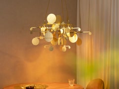 BALANCE: Contemporary Brass Chandelier with three light points.