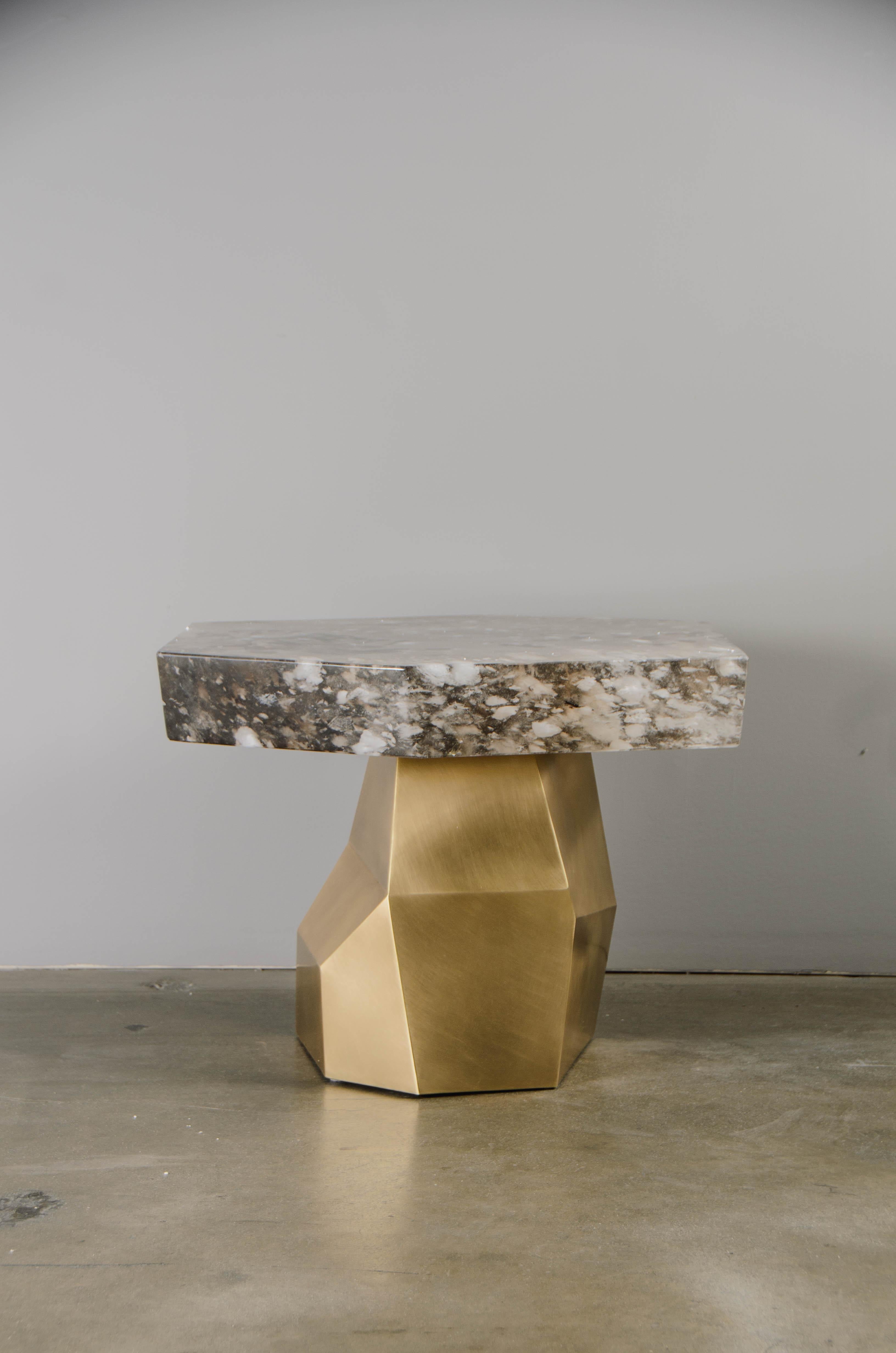 Facet Side Table with Smoke Crystal Top
Brass
Hand Repoussé
Smoked Crystal
Hand Carved
Limited Editon

Each piece is individually crafted and is unique. 

Repoussé is the traditional art of hand-hammering decorative relief onto sheet metal.