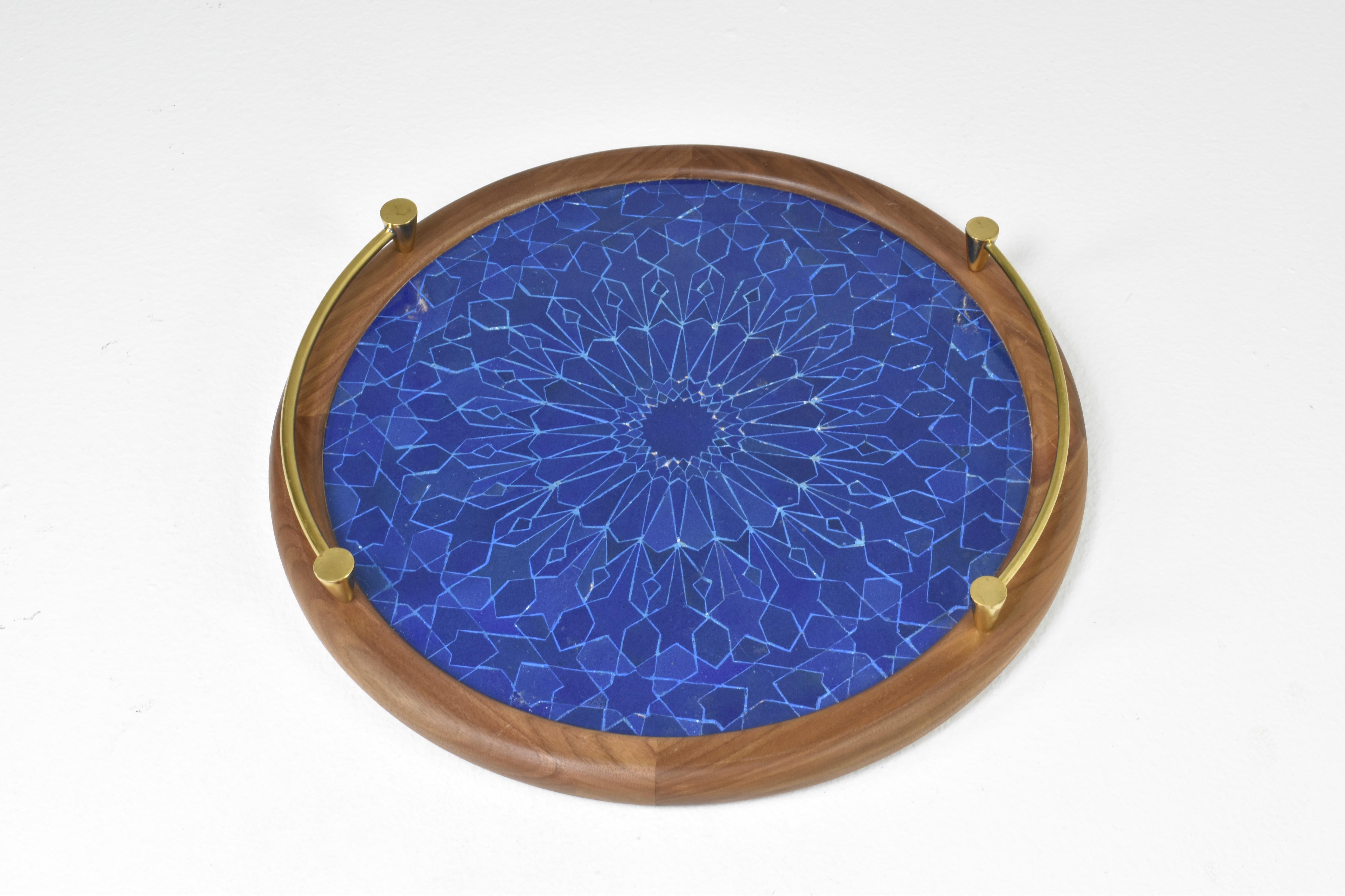 A contemporary handcrafted tray composed of a handmade zellige mosaic blue surface, a walnut frame and polished elegant brass handles. 
Designed by Jonathan Amar at his atelier in Rabat 

This piece is meticulously handcrafted, imbuing it with a