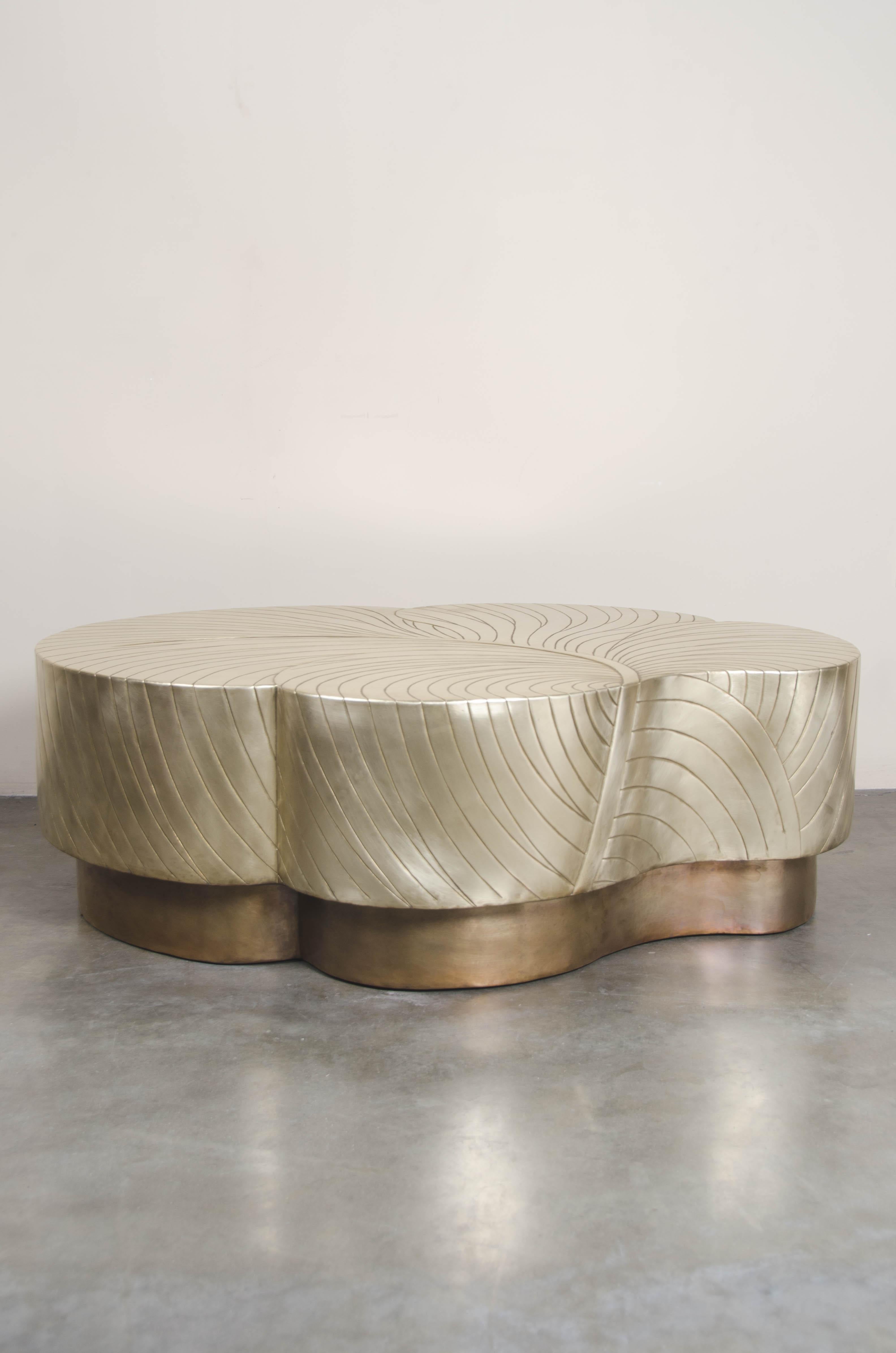 Leaf design cocktail table 
Brass
Hand Repoussé
Limited Edition
Each piece is individually crafted and is unique. 
Repoussé is the traditional art of hand-hammering decorative relief onto sheet metal. The technique originated around 800 BC
