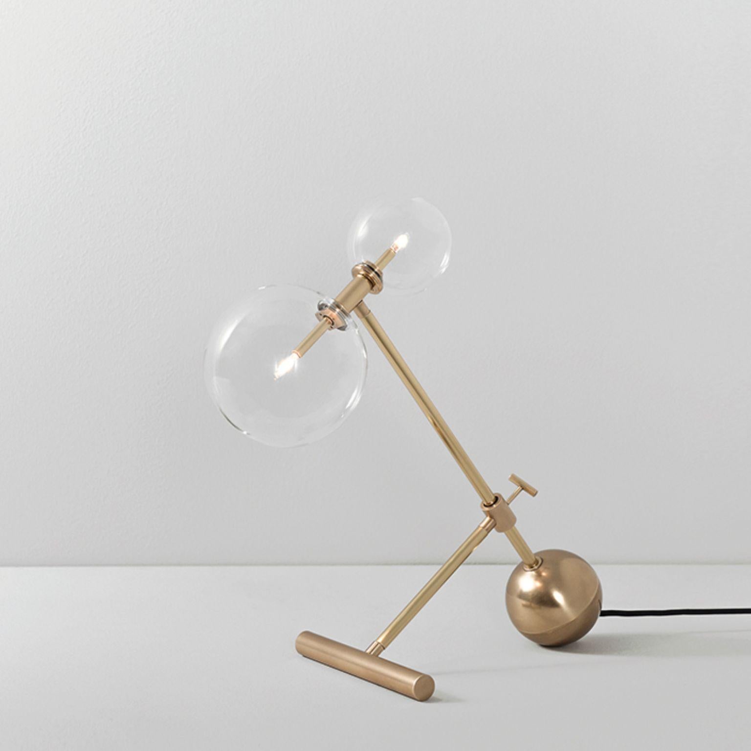Zosia Contemporary brass table lamp by Schwung
Dimensions: W 20 x D 42 x H 54 cm
Materials: Natural brass, hand blown glass globes
Other finishes available.

Cord 2m with inline on-off switch and plug. Switch location 50cm from the base.
Glass