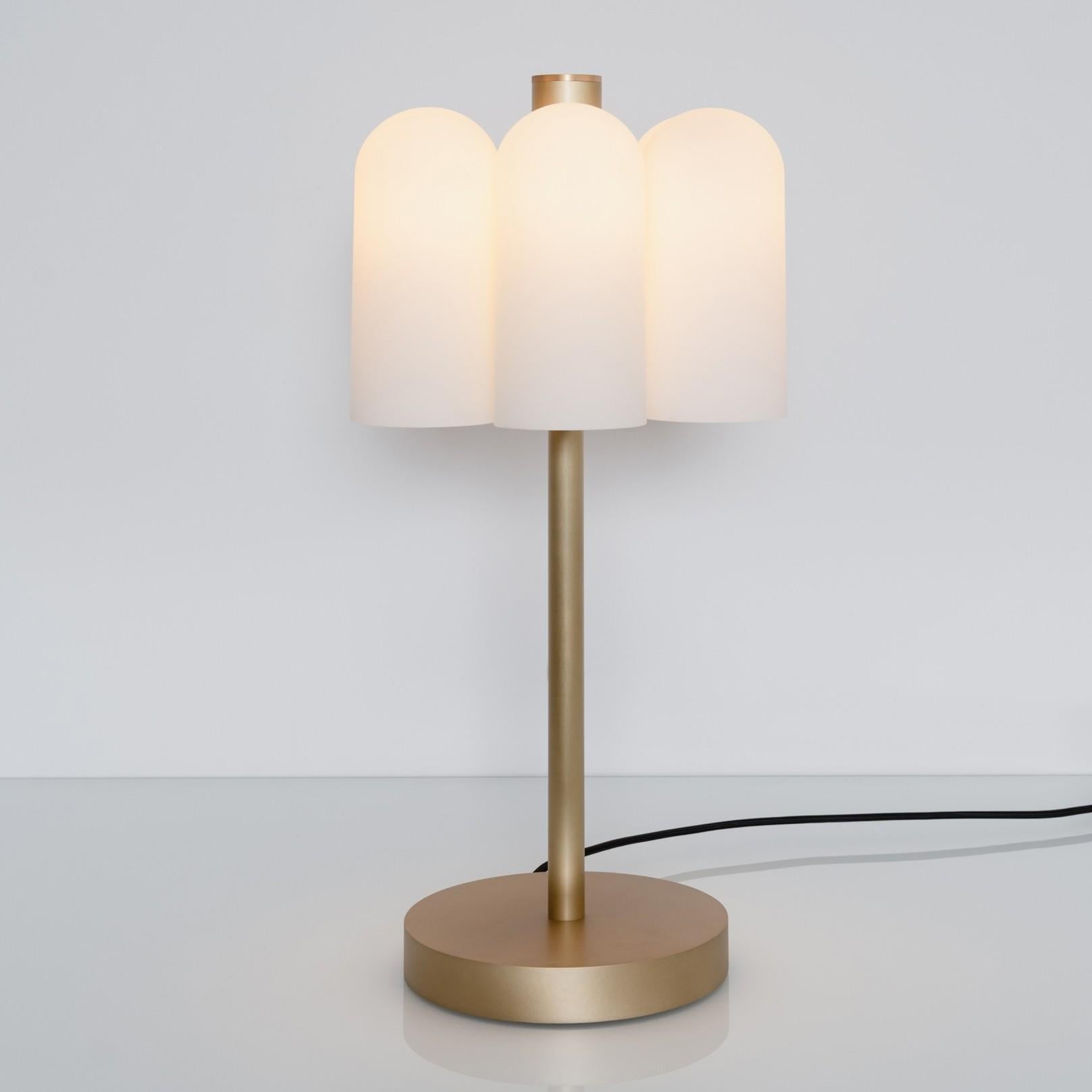 Odyssey 6 Brass Table Lamp by Schwung
Dimensions: D 31 x H 65 cm
Materials: Brass, frosted glass

Finishes available: Black gunmetal, polished nickel, brass


Schwung is a German word, and loosely defined, means energy or momentum of a positive