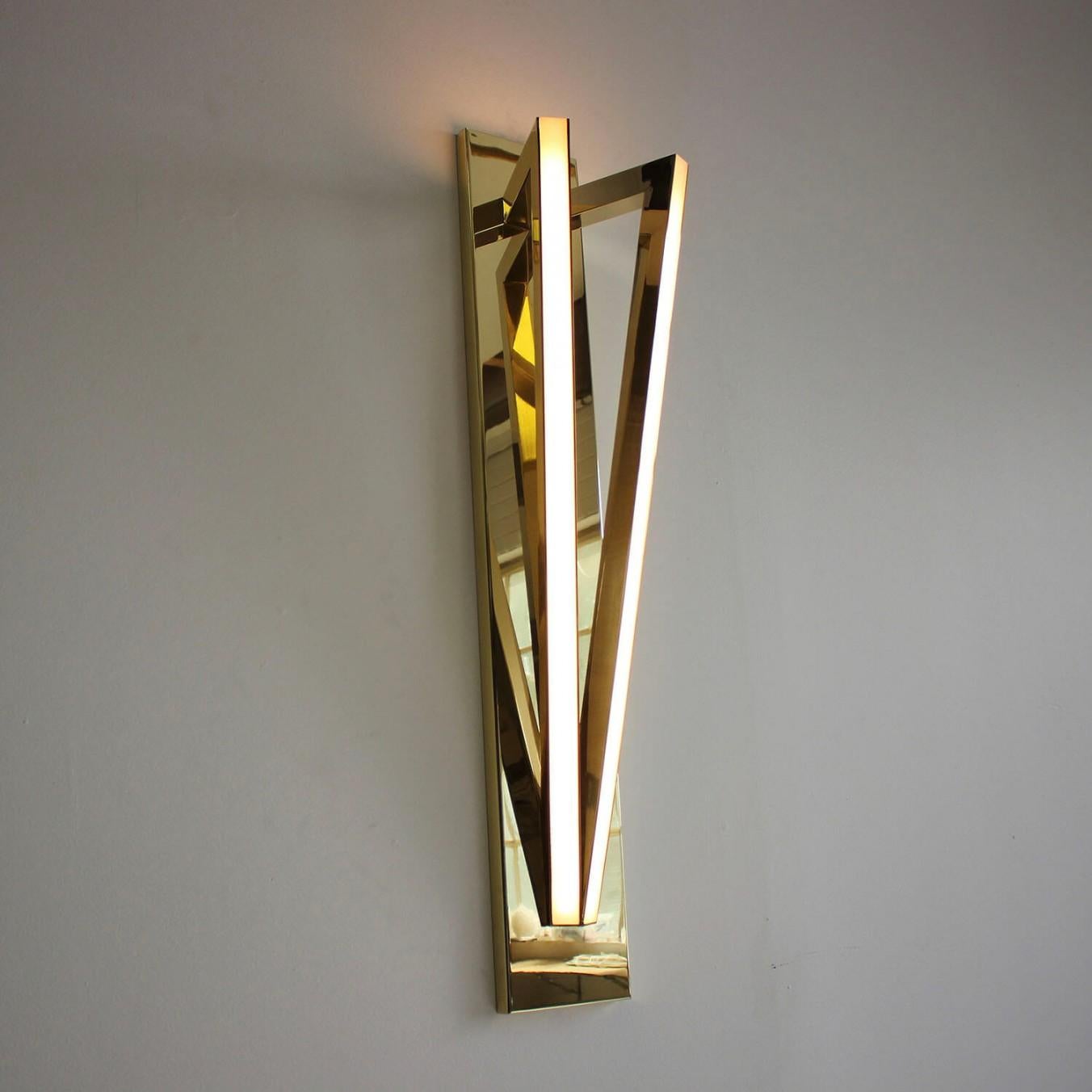 Contemporary Brass Wall Sconce - Pythagoras Twin 600 by Christopher Boots

Pythagoras, the revered philosopher and mathematician, believed the mysteries of our physical world could be revealed through Mathematics. For Pythagoras, numbers had