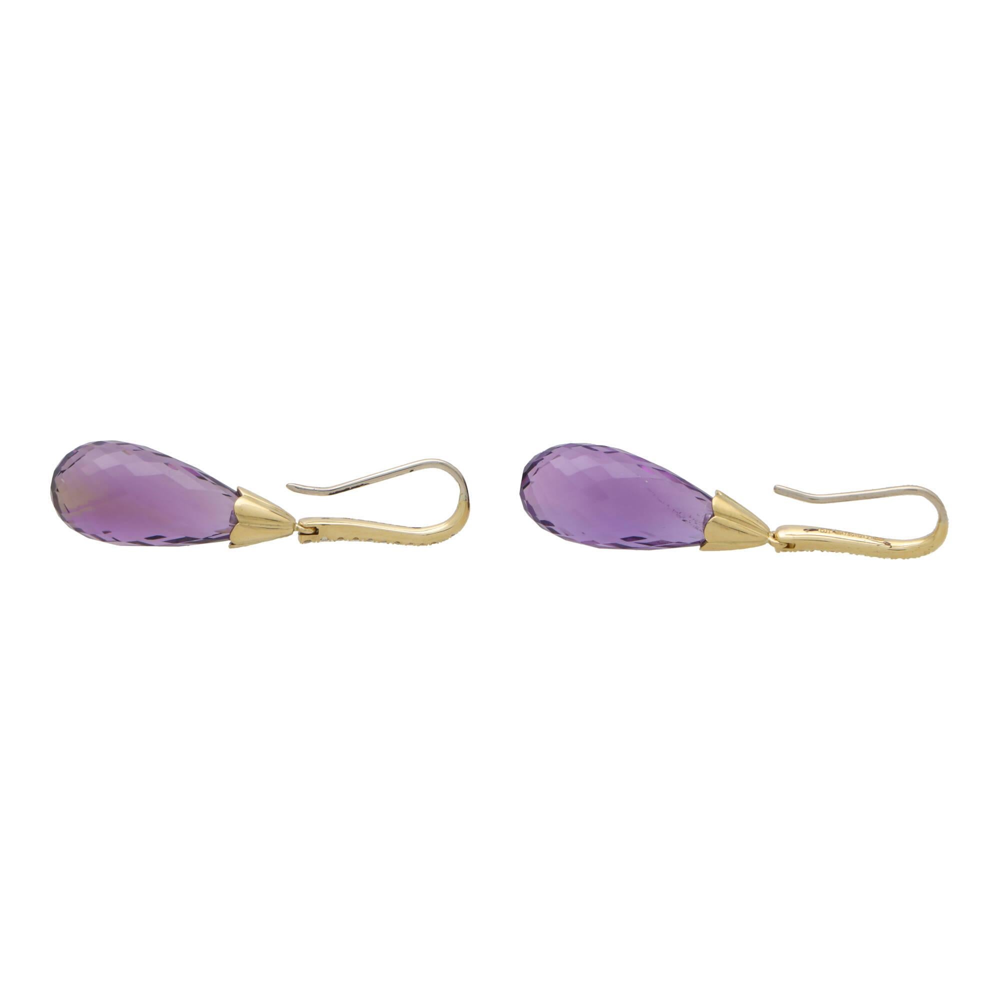 A beautiful pair of briolette amethyst and diamond drop earrings set in 18k yellow gold.

Each earring is firstly composed of a Sheppard hook fitting, set to the front with graduating round brilliant cut diamonds. Hanging from each hook is a