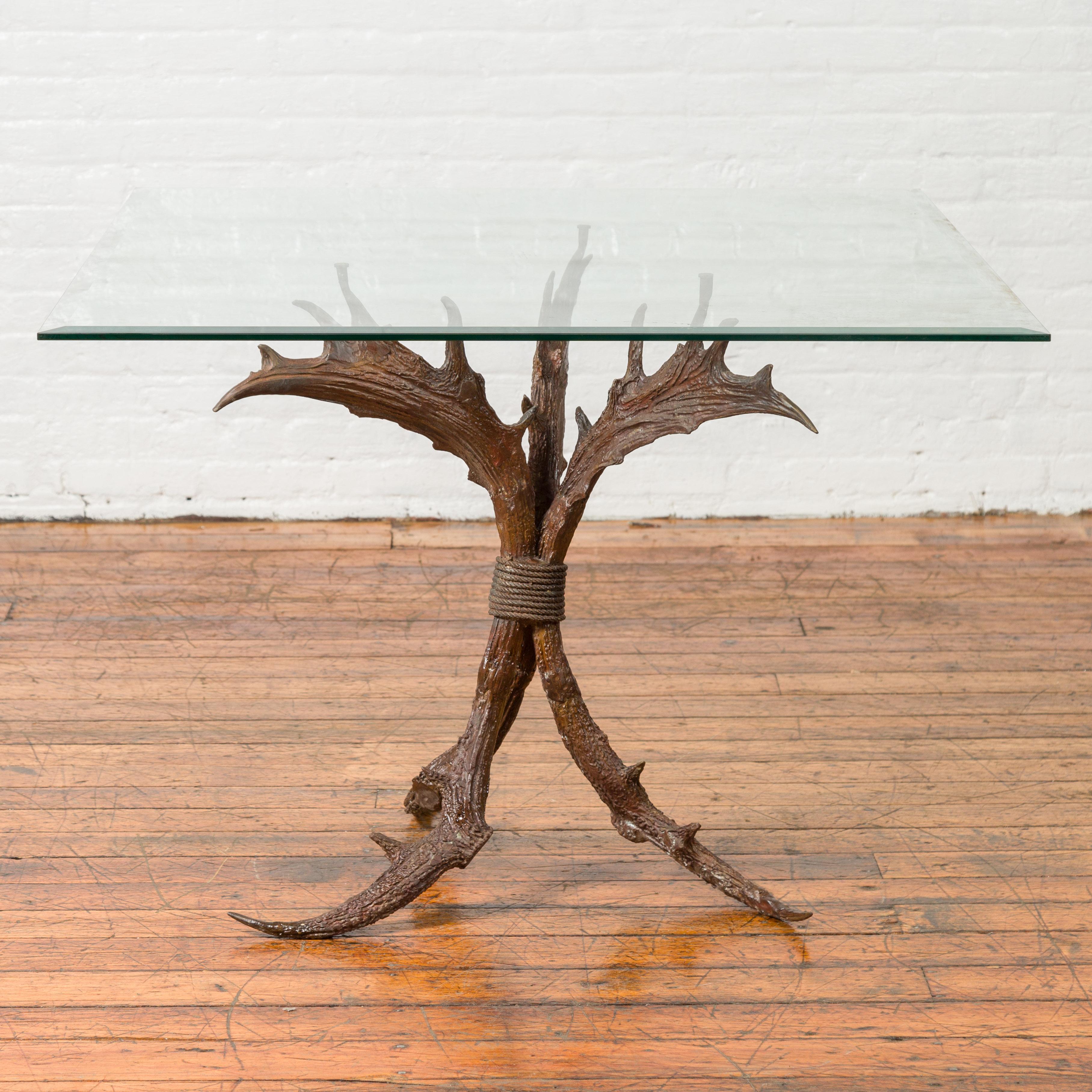 A contemporary bronze antler dining table base with brown patina. The top is not included but shown on the photos to allow a better visualization of the possibilities. Created with the traditional technique of the lost-wax (à la cire perdue) that