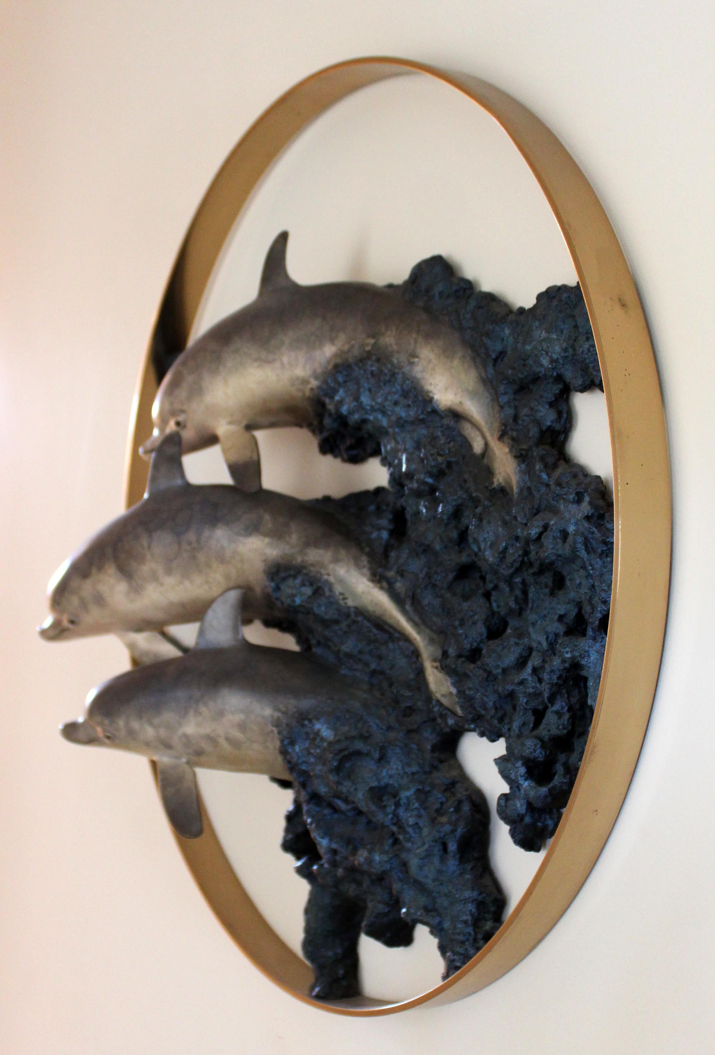 For your consideration is a gorgeous hanging wall sculpture of dolphins, made of bronze and polished brass, 