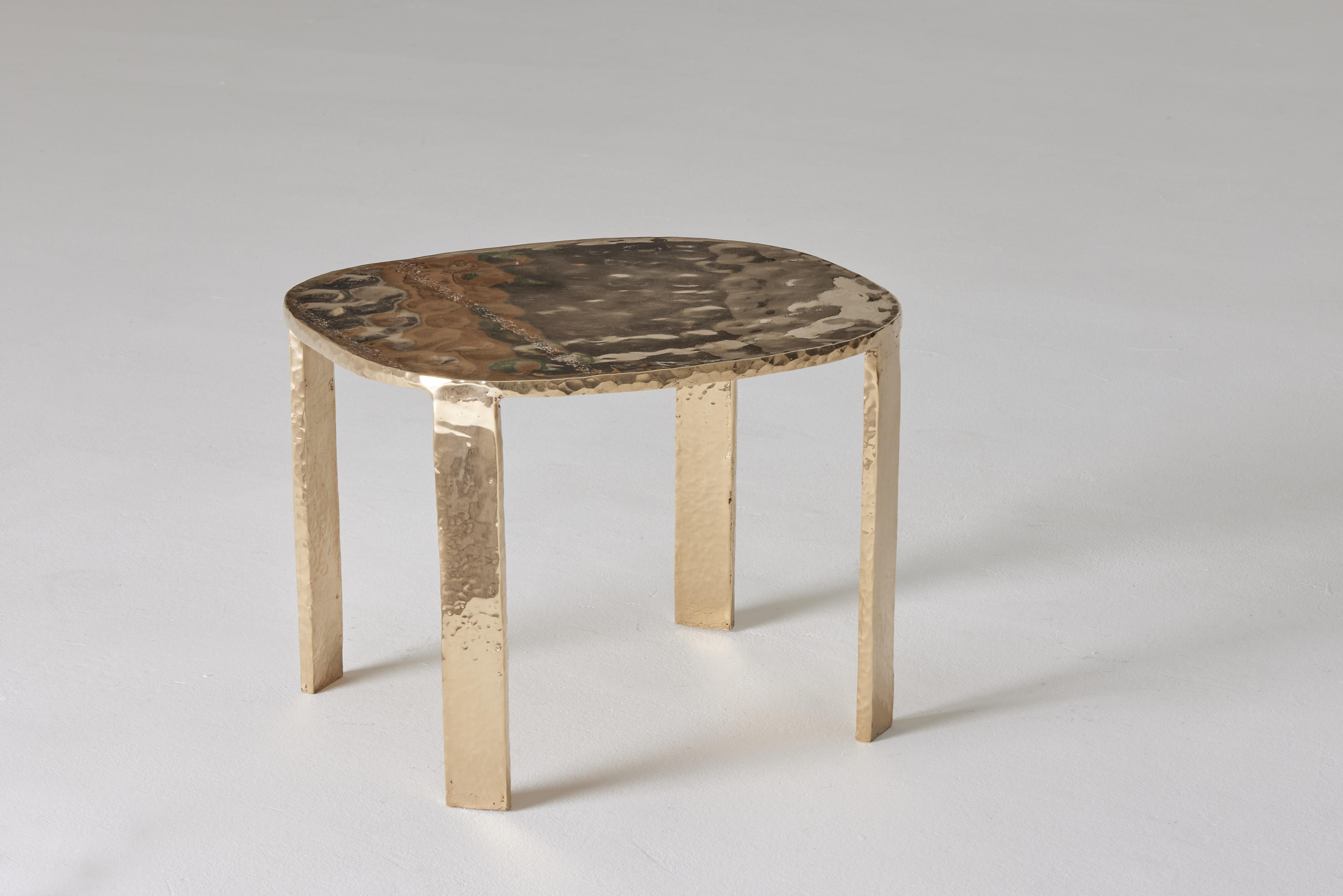 Auréas Side Tables by Colo Studio
Material: Bronze, golden polish
Dimensions:
H 42 x 31 x 40 cm (Quantity: 3)
H 33 x 40 x 45 cm (Quantity: 1)
H 33 x 40 x 60 cm (Quantity: 1)
Year: 2024

Merging imagery of the domestic, the decorative and the