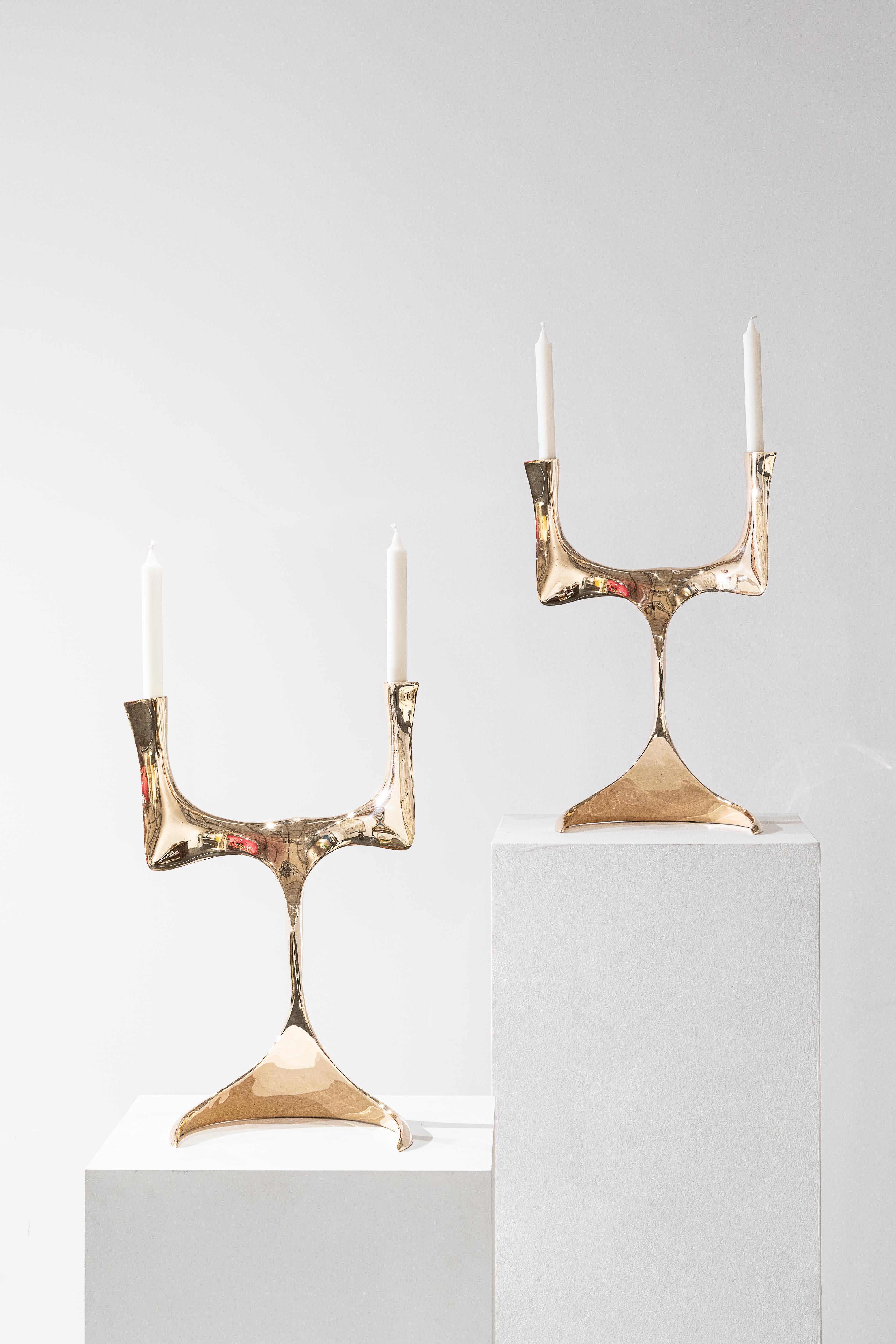 Elan Candlesticks by Pierre Salagnac
Material: Bronze, golden polish
Dimensions: H 47,5 x 30 x 24 cm
Year: 2023
Type: unique pieces, signed 

Revealing the organic curves of nature in the metal block with great talent, Pierre Salagnac has made a