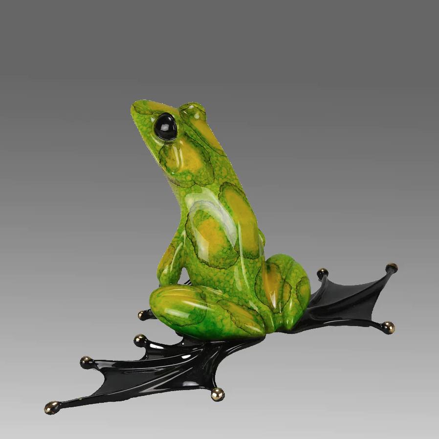 A magnificent limited edition bronze study of a lime green and black enamel tropical frog in a seated position with its head turned exhibiting very fine enamel colours and excellent tactile surface, signed Tim, stamped 'Frogman' and numbered