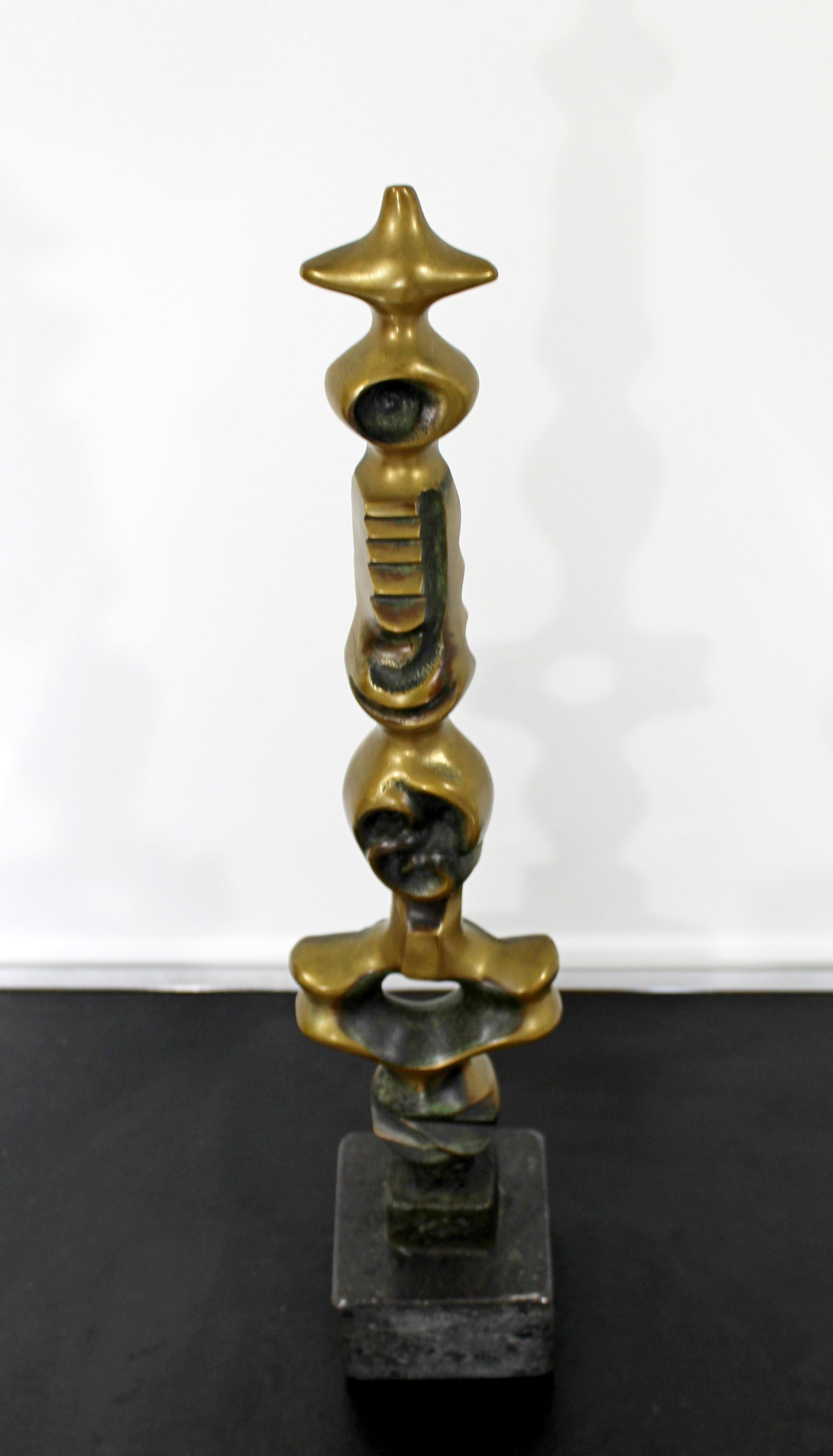 For your consideration is a magnificent, bronze on marble table sculpture, depicting a TOTEM pole, signed and numbered 102/125 by Kieff Grediaga, circa 1985. In excellent condition. The dimensions are 5