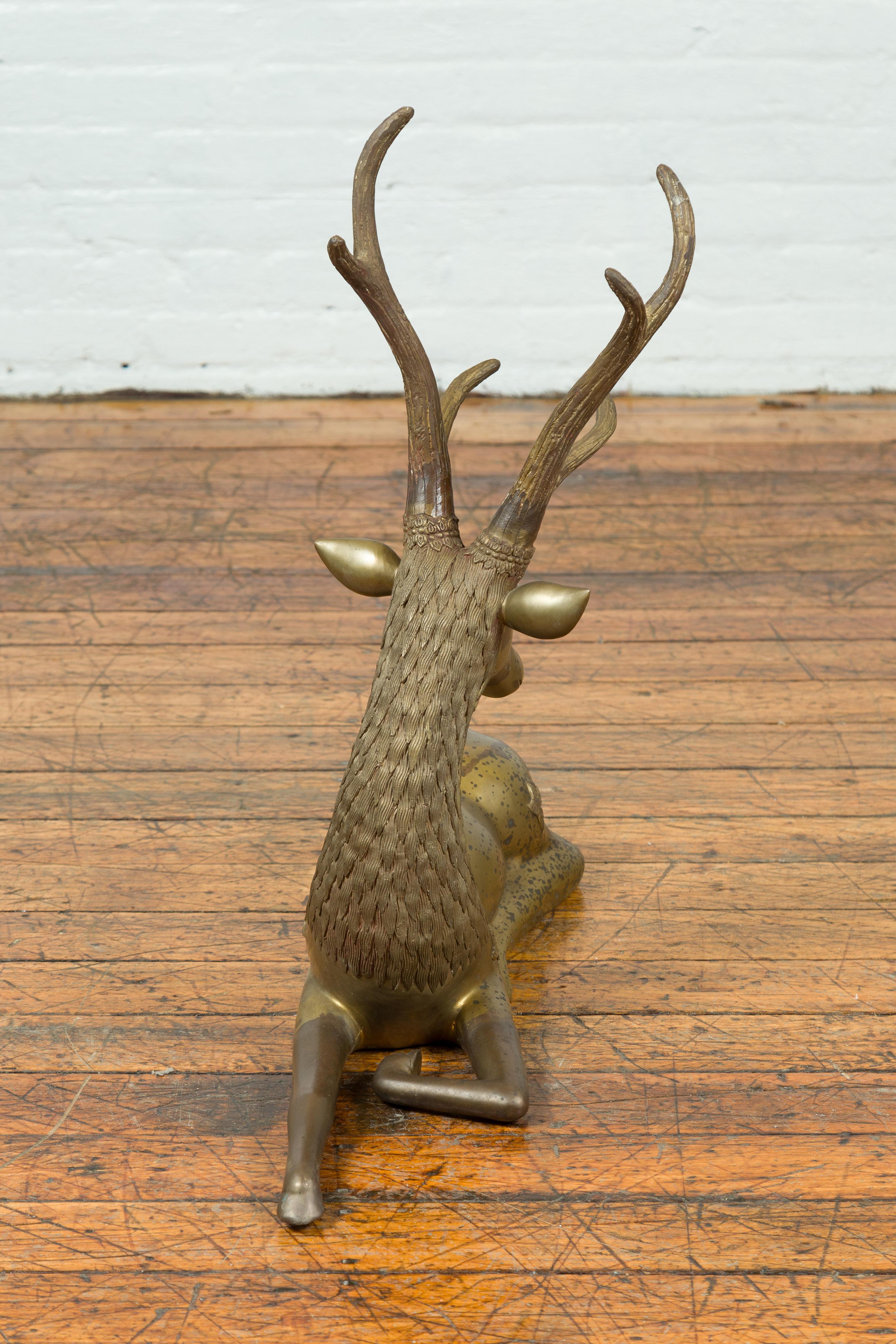 Contemporary Bronze Reclining Deer Statue with Golden Patina and Large Antlers 3