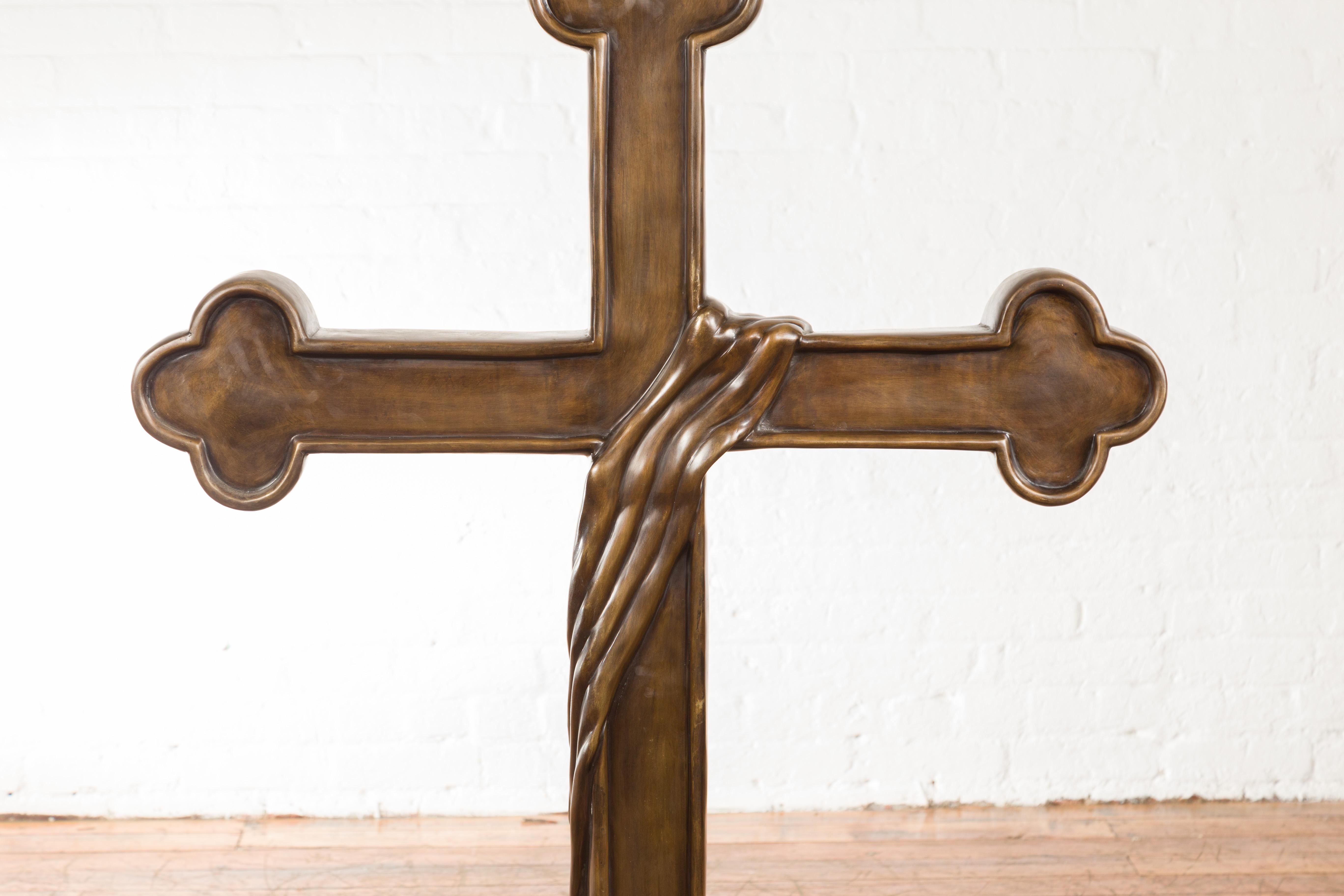 Contemporary Bronze Religious Cross with Trifold Extremities and Rocky Base For Sale 1