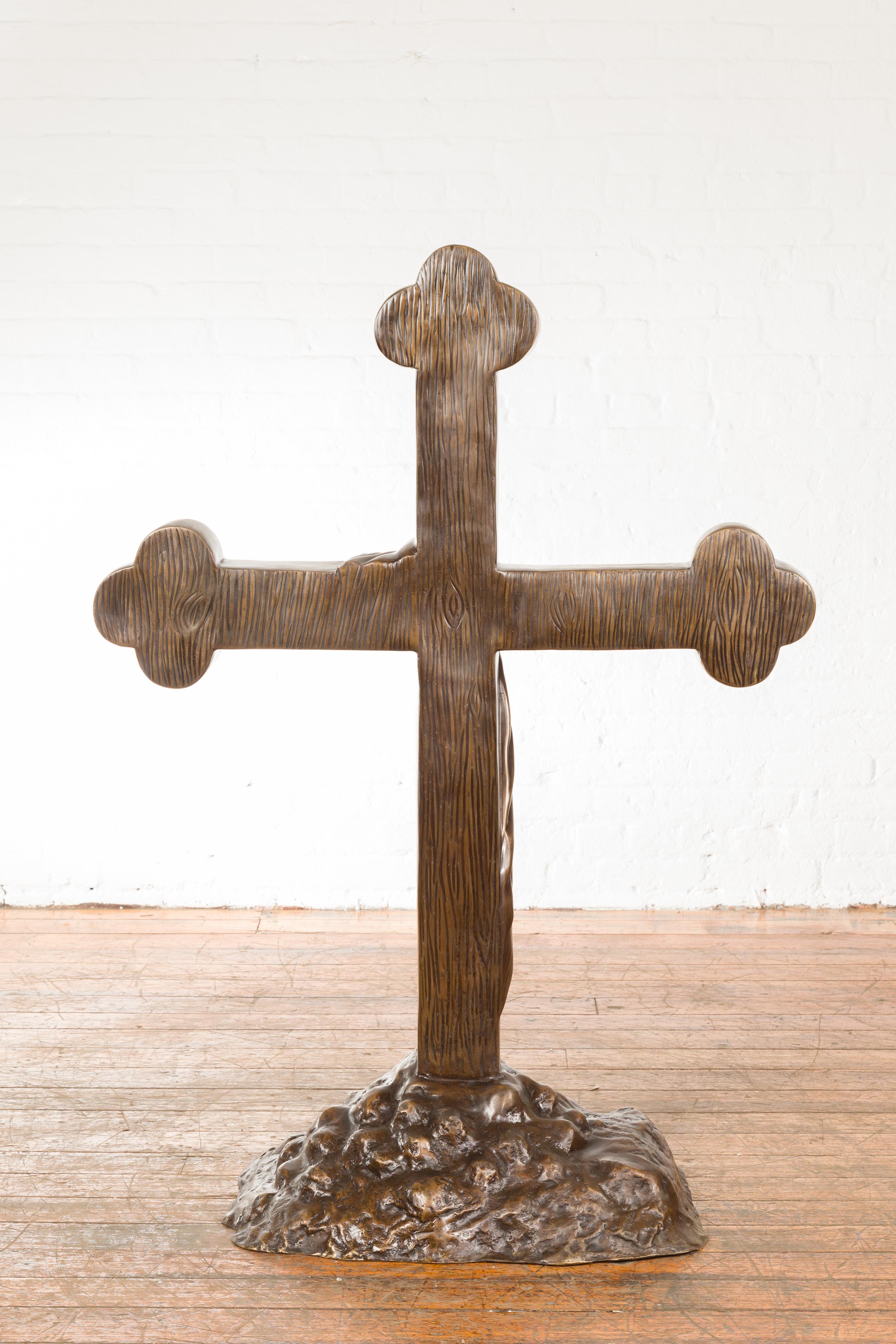 Contemporary Bronze Religious Cross with Trifold Extremities and Rocky Base For Sale 5