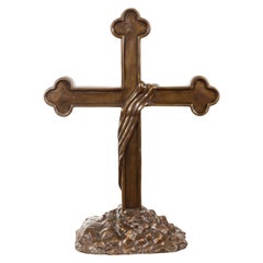 Contemporary Bronze Religious Cross with Trifold Extremities and Rocky Base